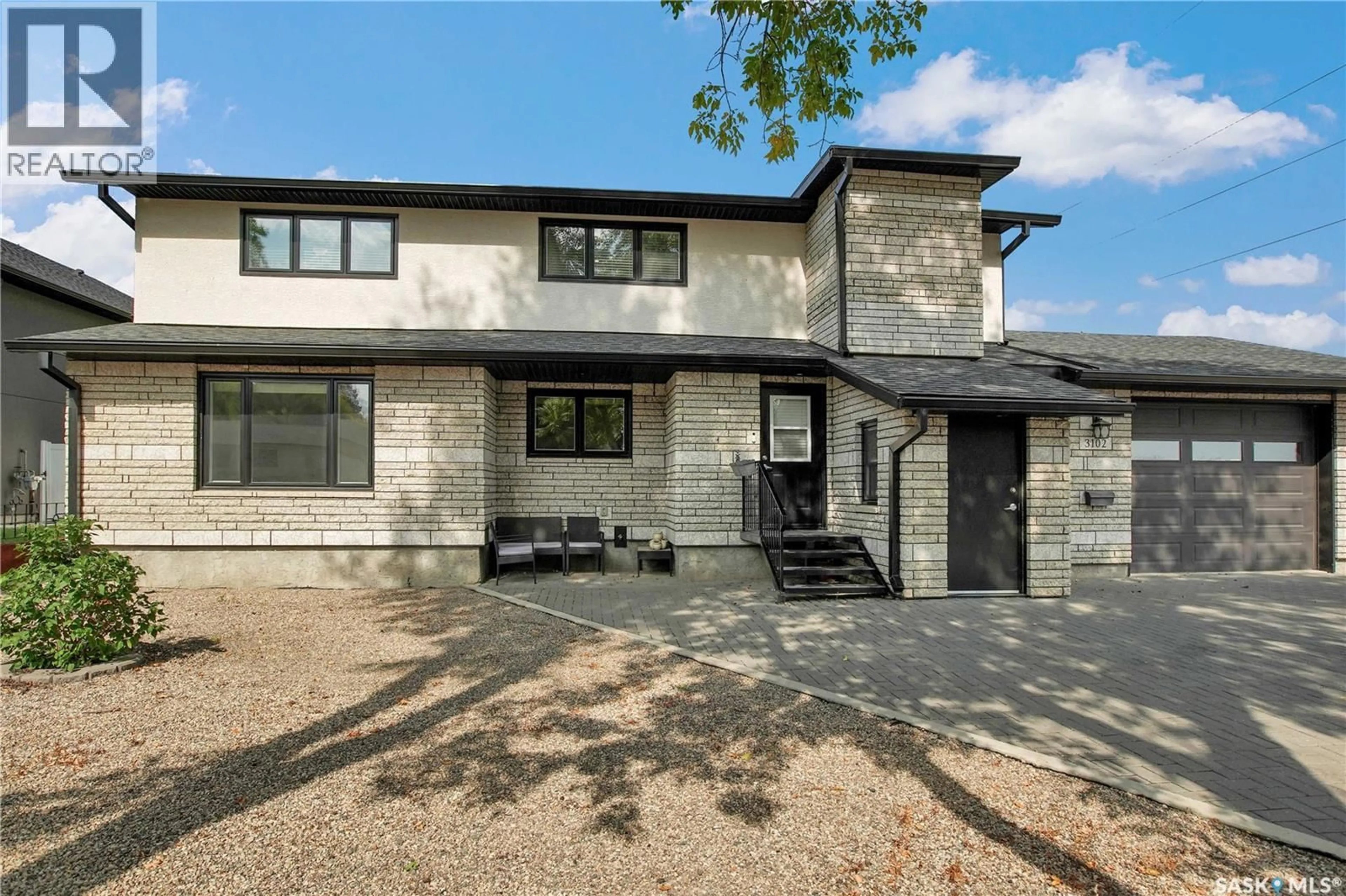 Home with brick exterior material, street for 3102 CAEN STREET, Saskatoon Saskatchewan S7M3N5