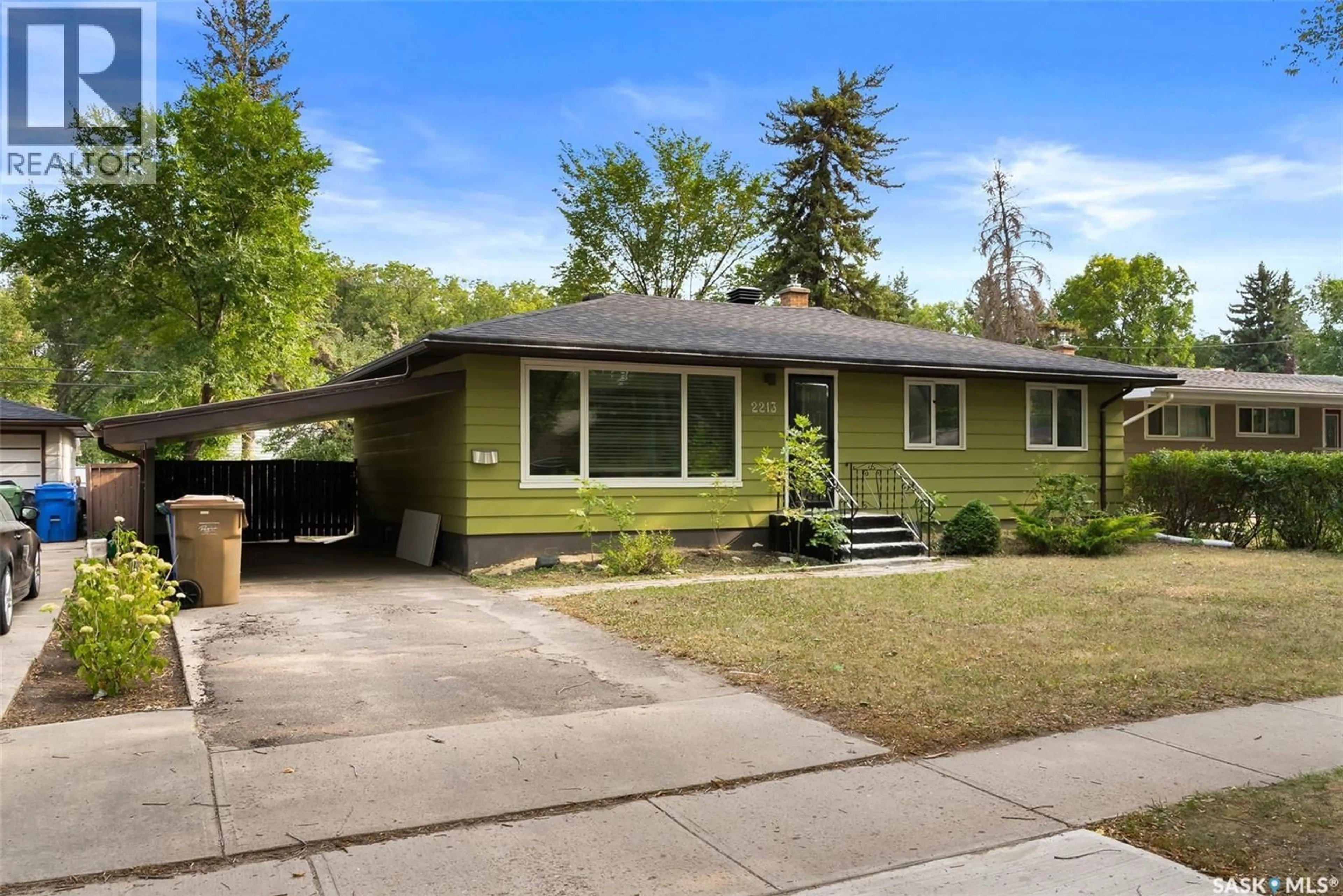 Home with vinyl exterior material, street for 2213 GRANT ROAD, Regina Saskatchewan S4S5C9
