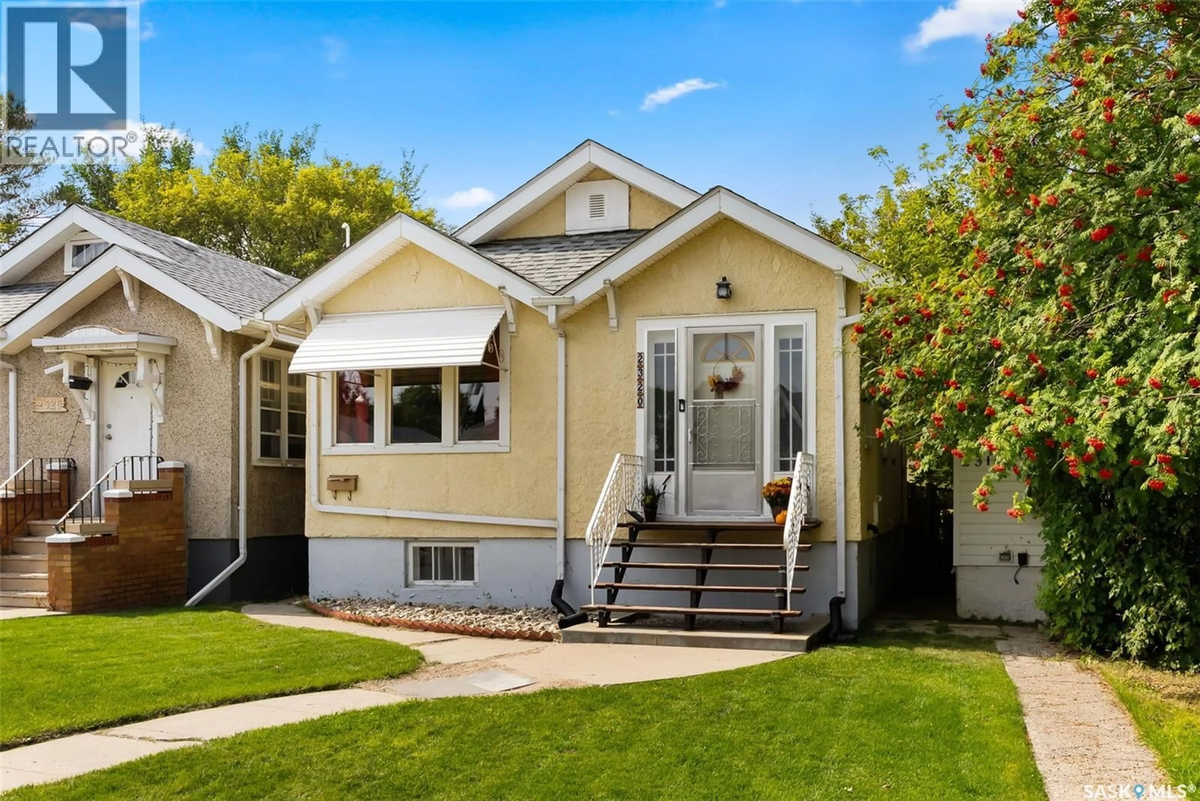 Home with vinyl exterior material, street for 2320 BRODER STREET, Regina Saskatchewan S4N3S8