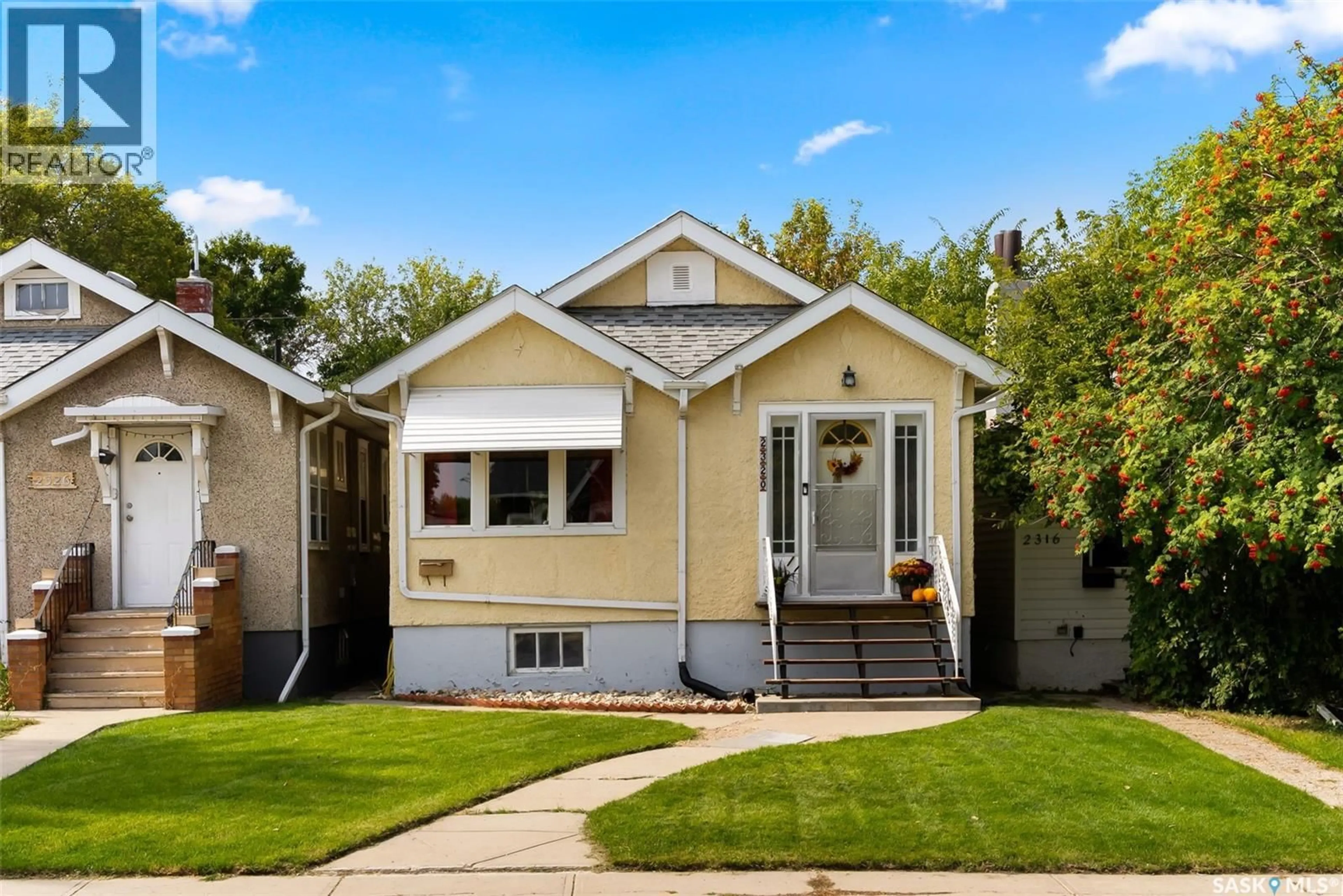 Home with vinyl exterior material, street for 2320 BRODER STREET, Regina Saskatchewan S4N3S8
