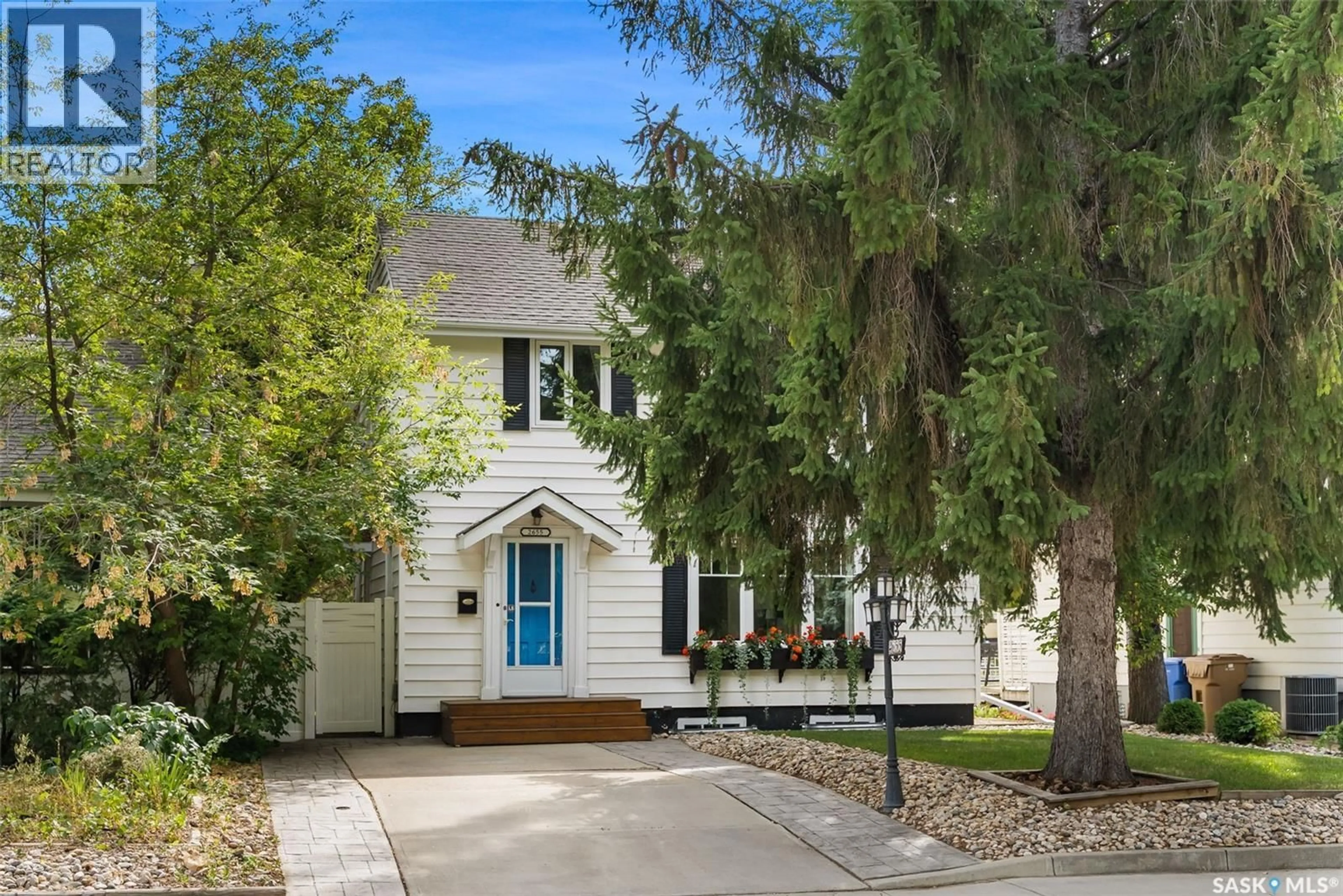 Home with vinyl exterior material, street for 2655 19TH AVENUE, Regina Saskatchewan S4T1X2