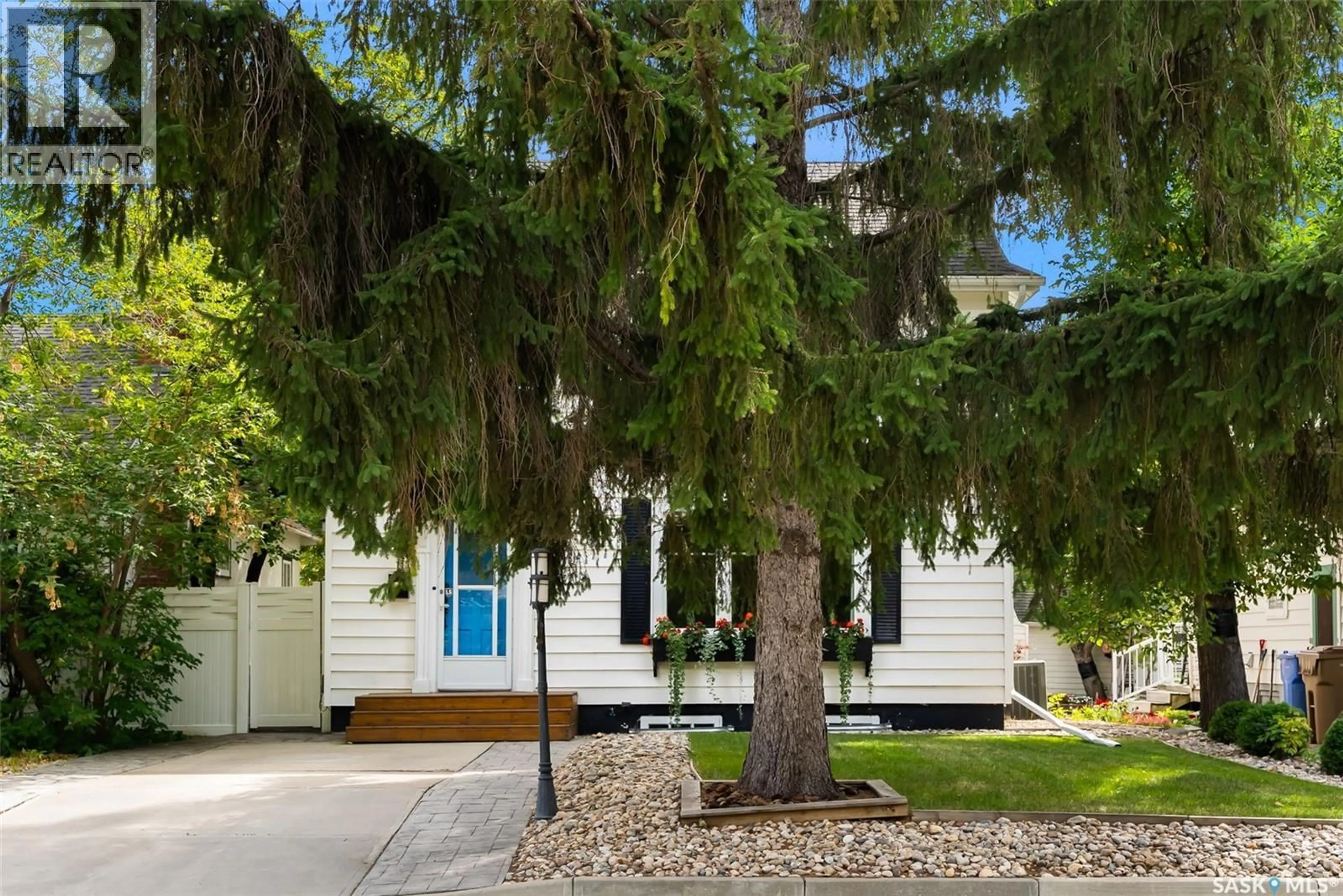 Home with vinyl exterior material, street for 2655 19TH AVENUE, Regina Saskatchewan S4T1X2