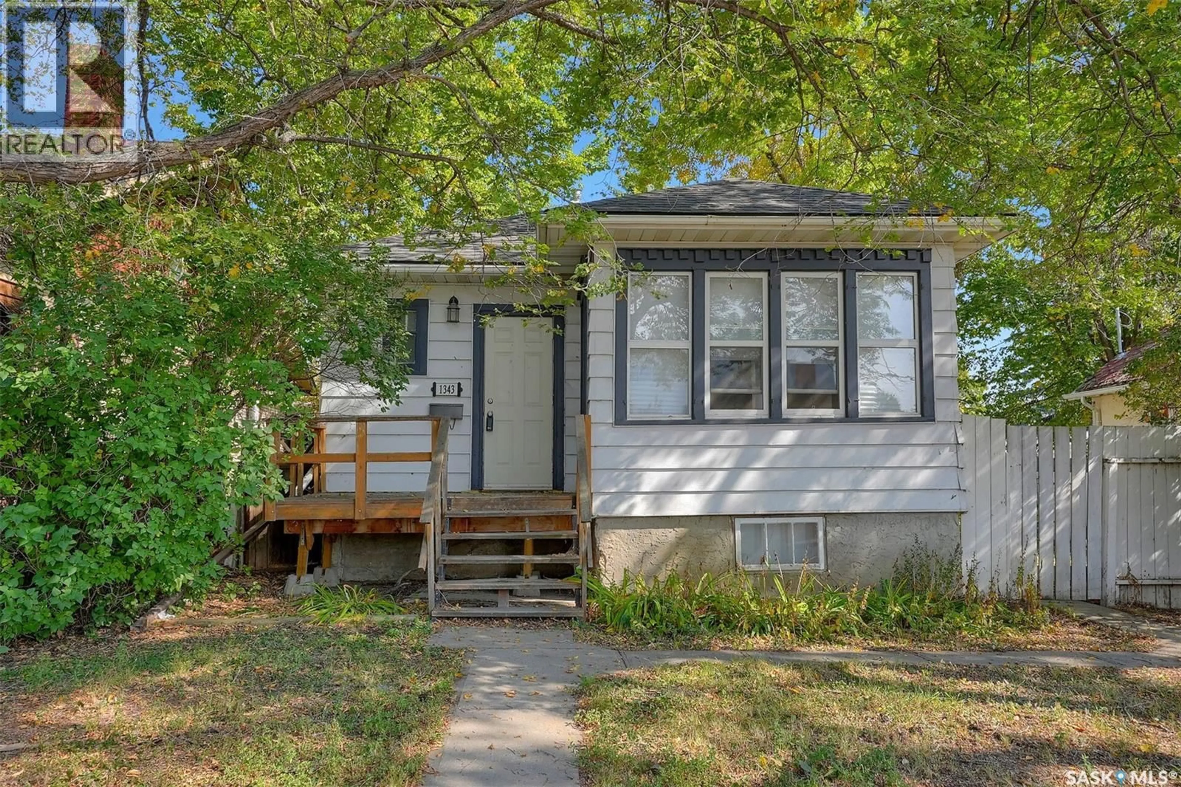 Home with vinyl exterior material, street for 1343 ELPHINSTONE STREET, Regina Saskatchewan S4T3M5