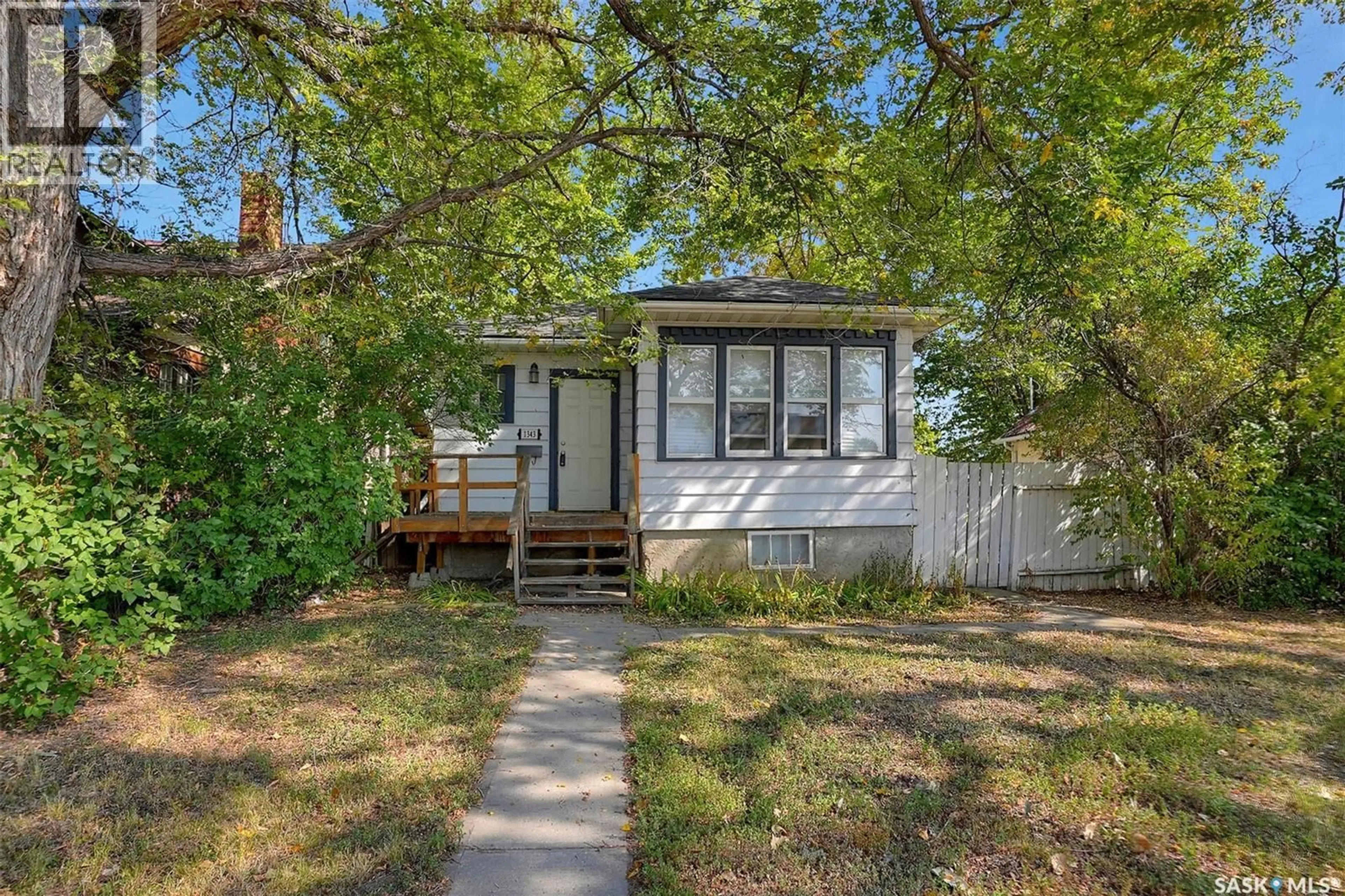 Home with vinyl exterior material, street for 1343 ELPHINSTONE STREET, Regina Saskatchewan S4T3M5