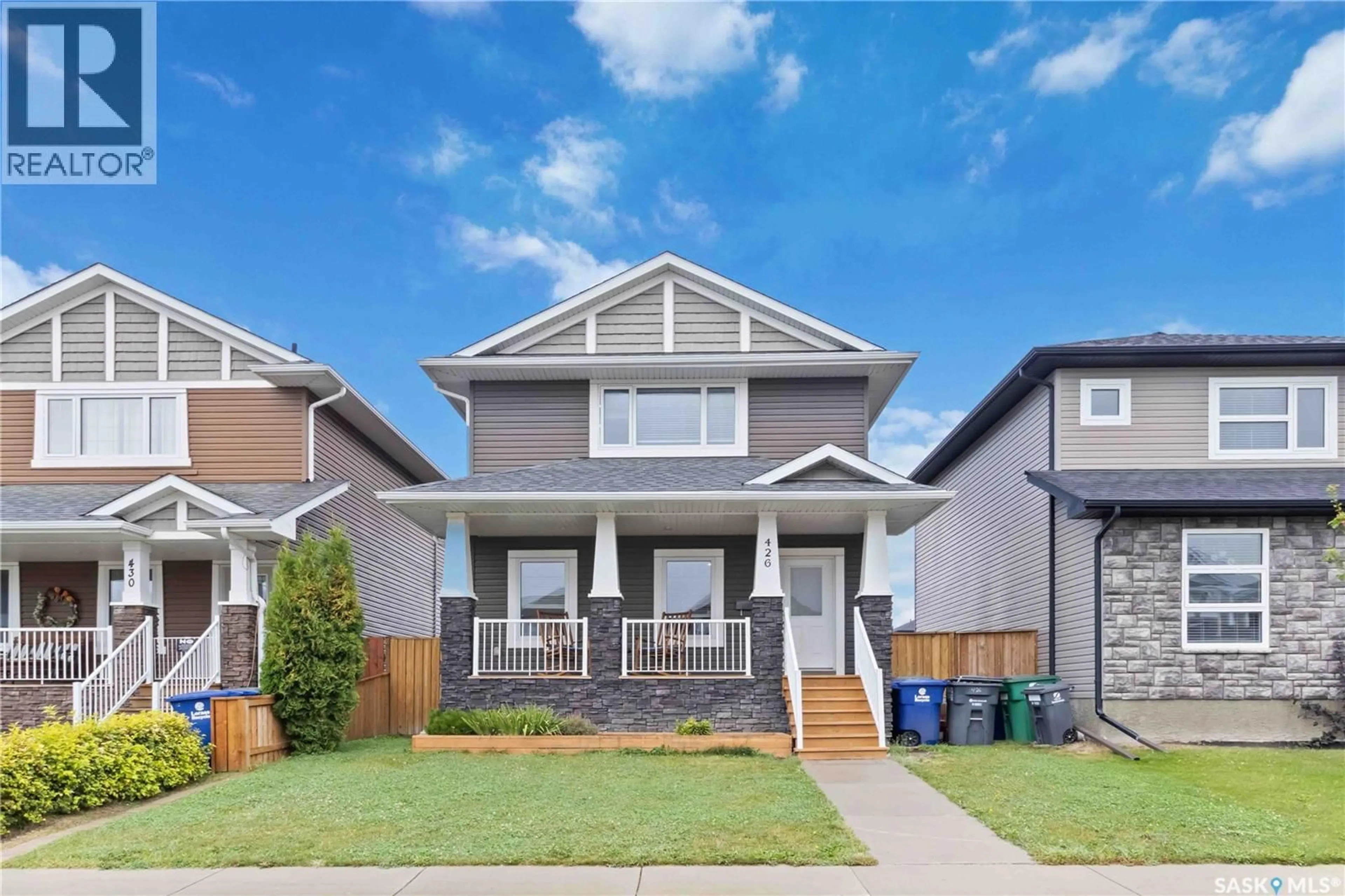 Home with vinyl exterior material, street for 426 VELTKAMP CRESCENT, Saskatoon Saskatchewan S7T0S2