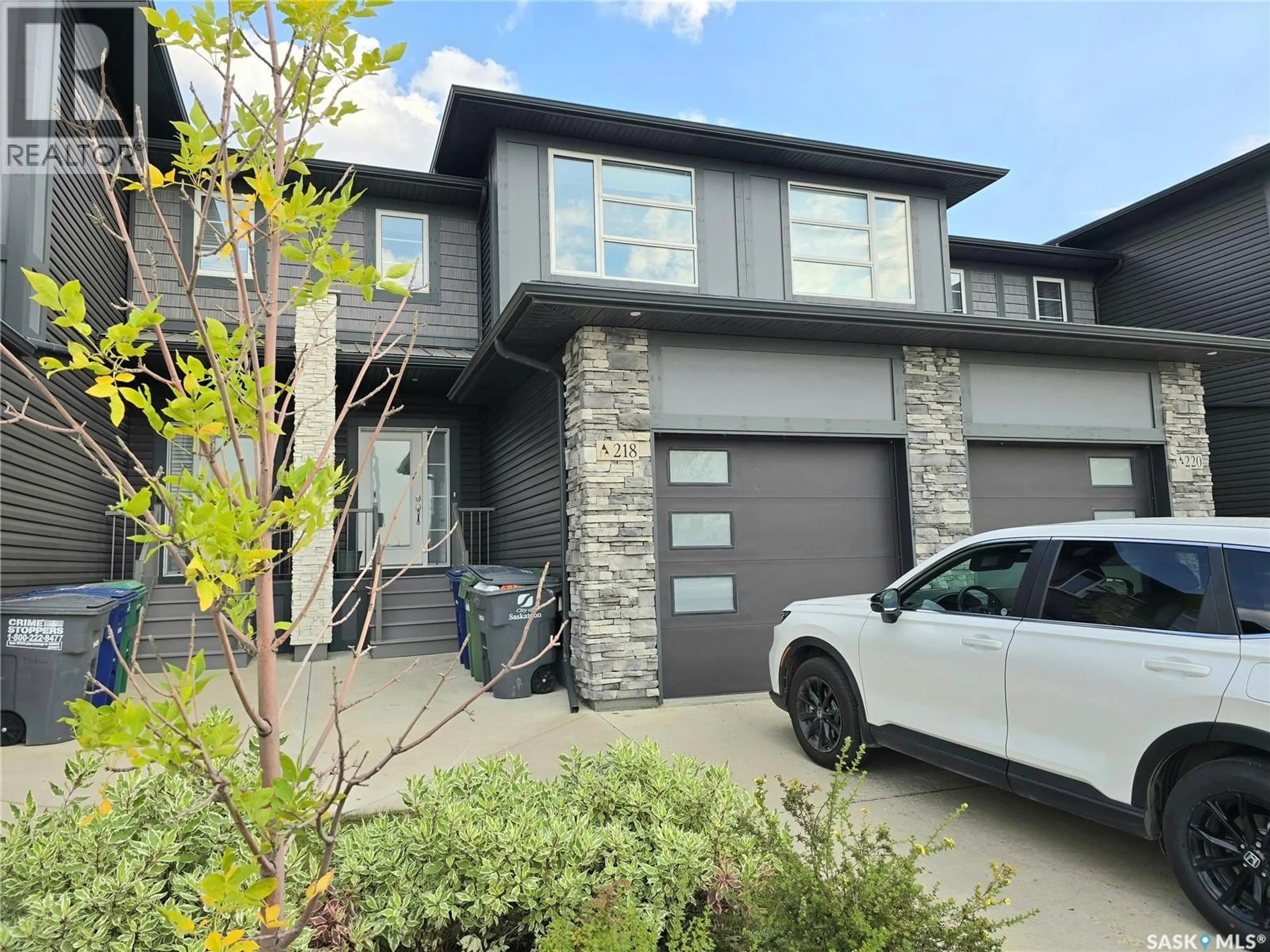 Home with brick exterior material, street for 218 BRIGHTON GATE, Saskatoon Saskatchewan S7V0P6