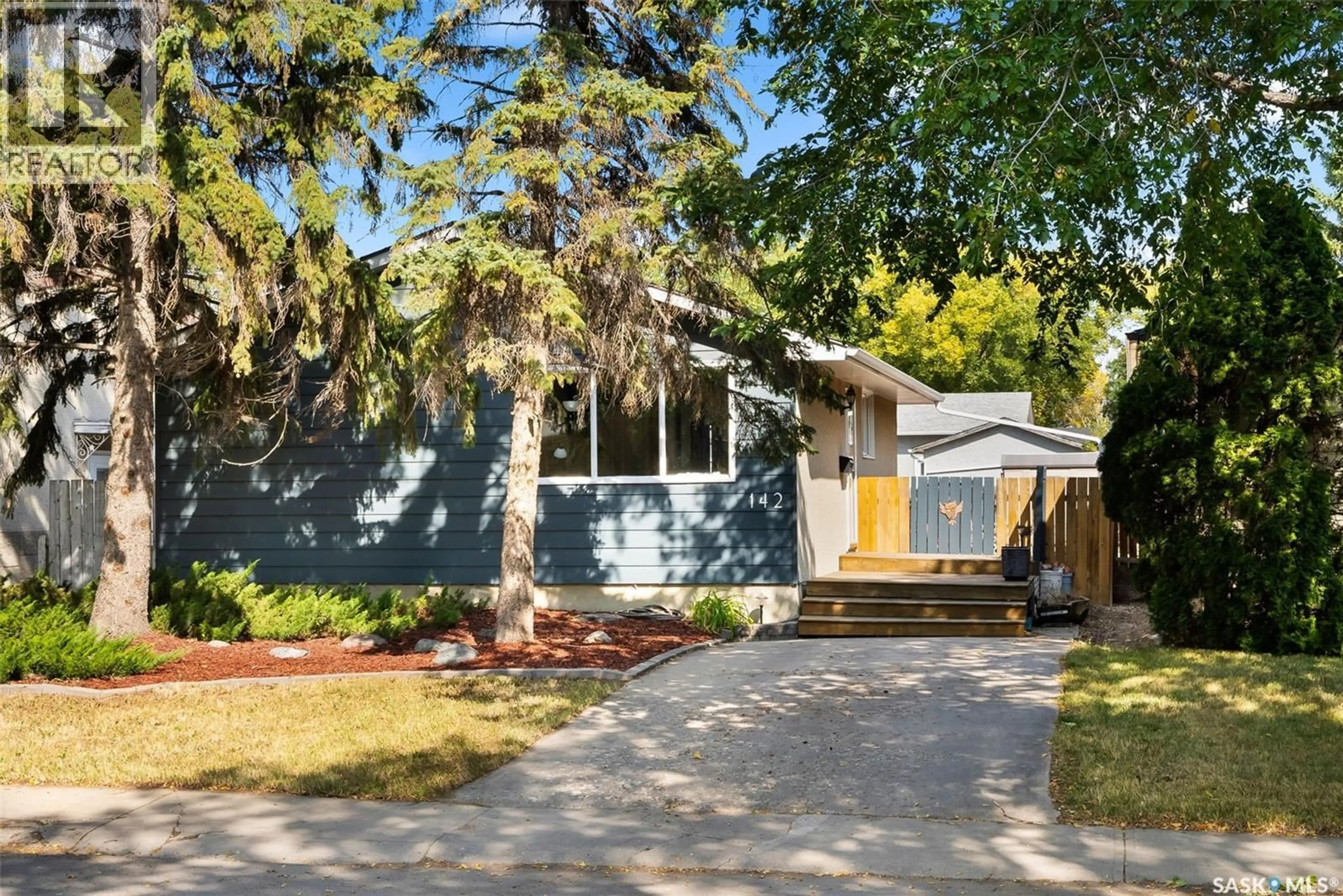 Home with vinyl exterior material, street for 142 COOPER CRESCENT, Regina Saskatchewan S4R4J7