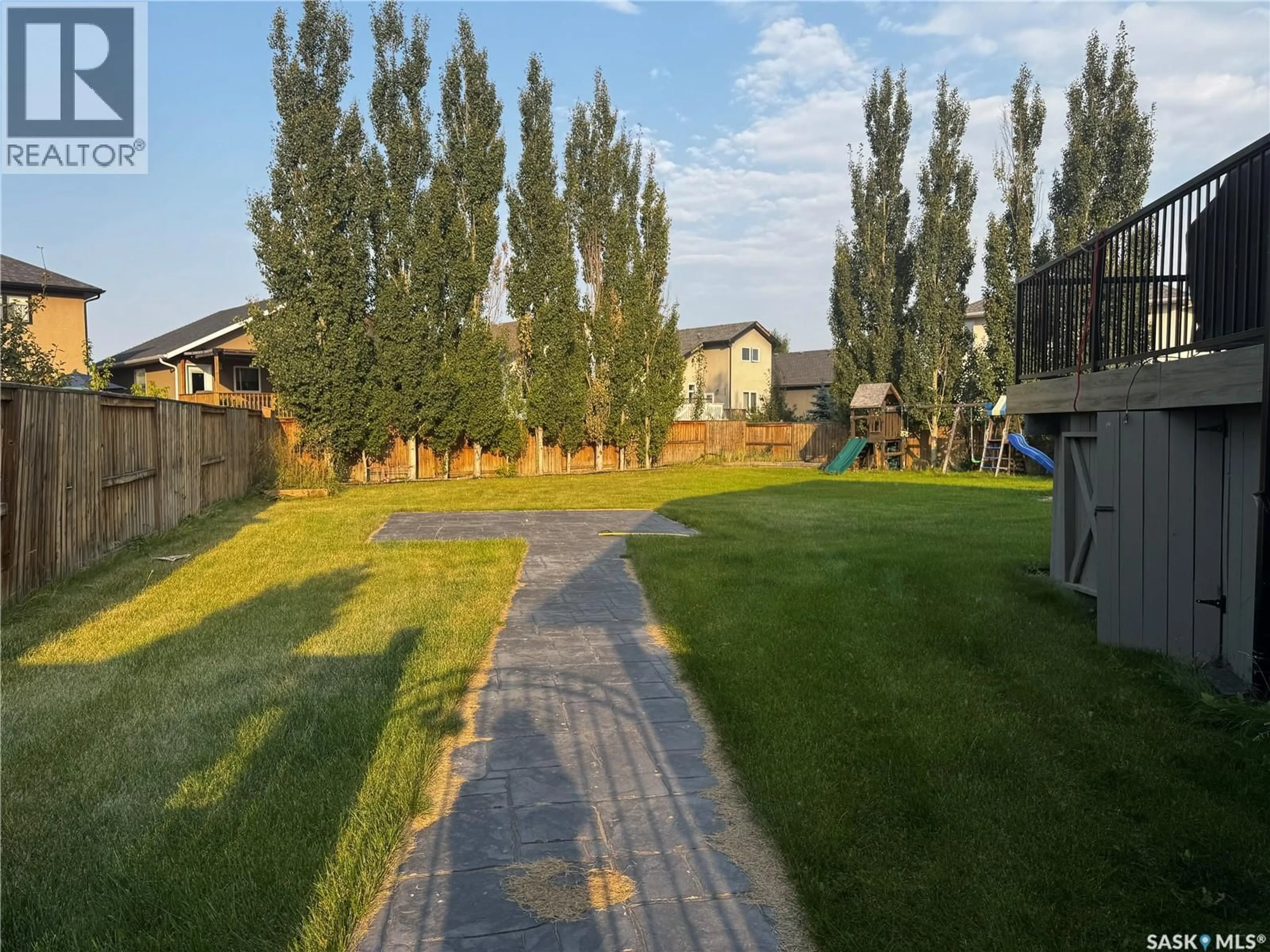 A pic from outside/outdoor area/front of a property/back of a property/a pic from drone, street for 334 REMPEL BAY, Saskatoon Saskatchewan S7T0J3