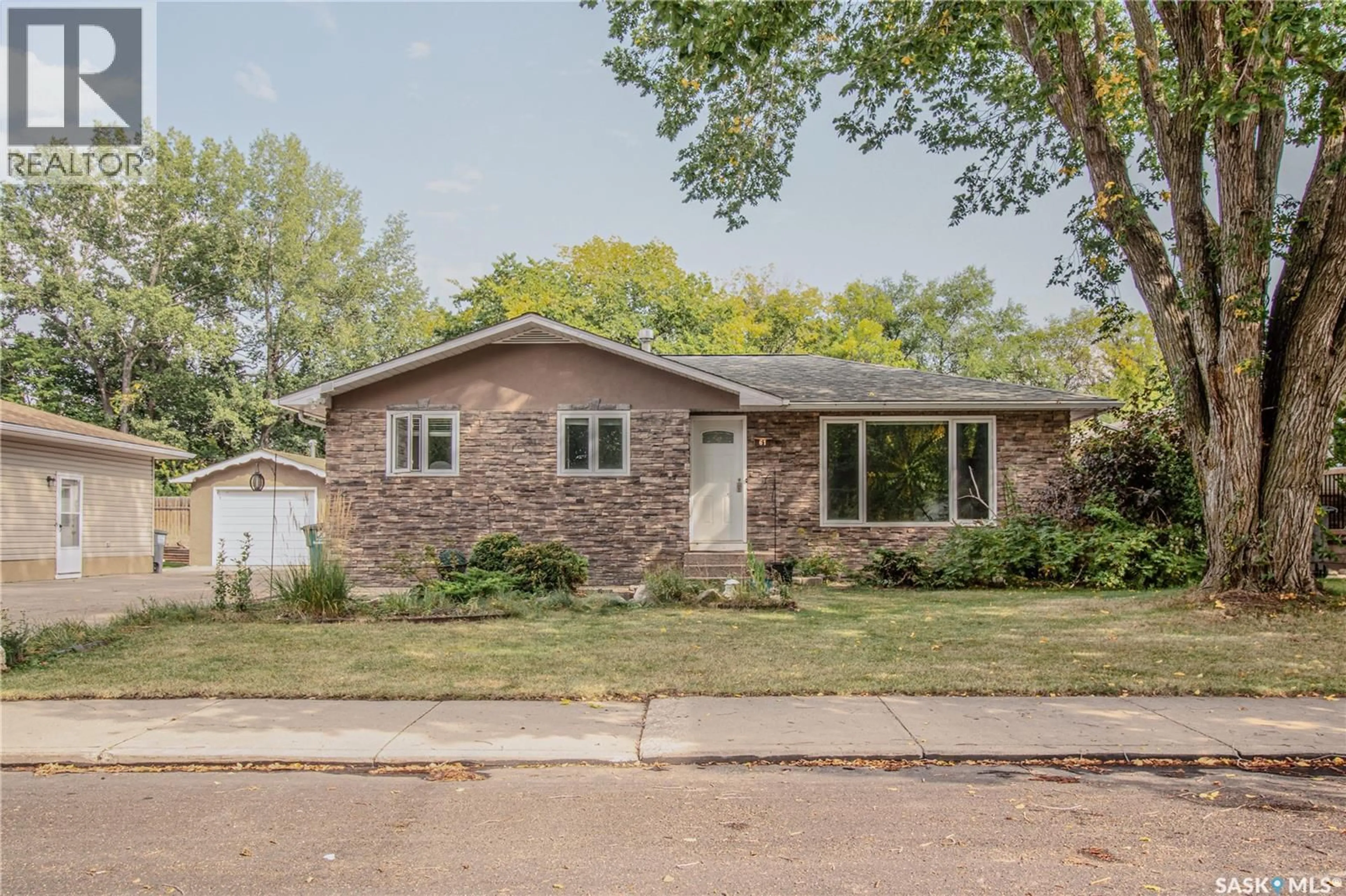 Home with brick exterior material, street for 61 SPARLING CRESCENT, Saskatoon Saskatchewan S7H3M1