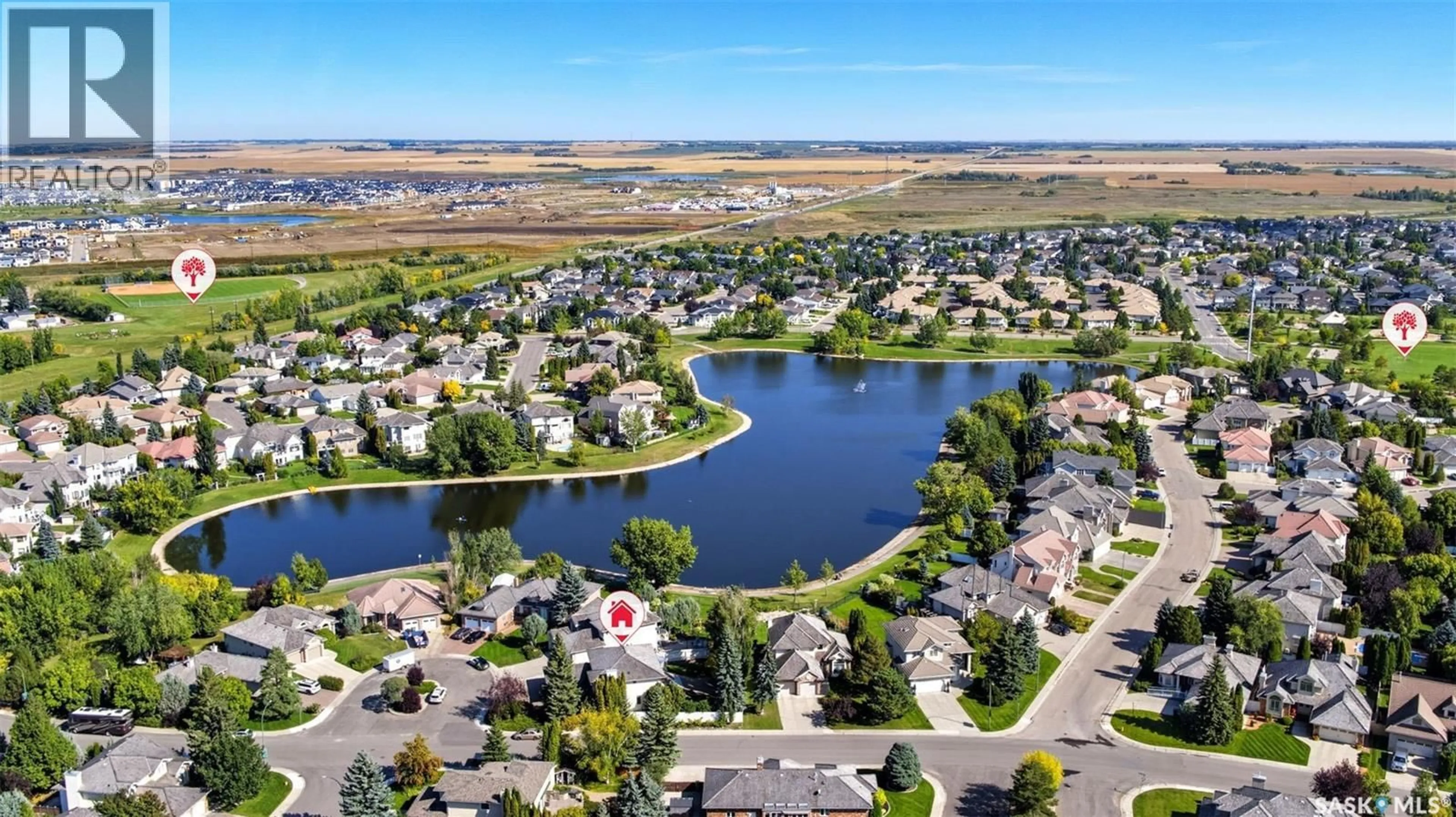 A pic from outside/outdoor area/front of a property/back of a property/a pic from drone, water/lake/river/ocean view for 403 BRAESIDE BAY, Saskatoon Saskatchewan S7V1A3
