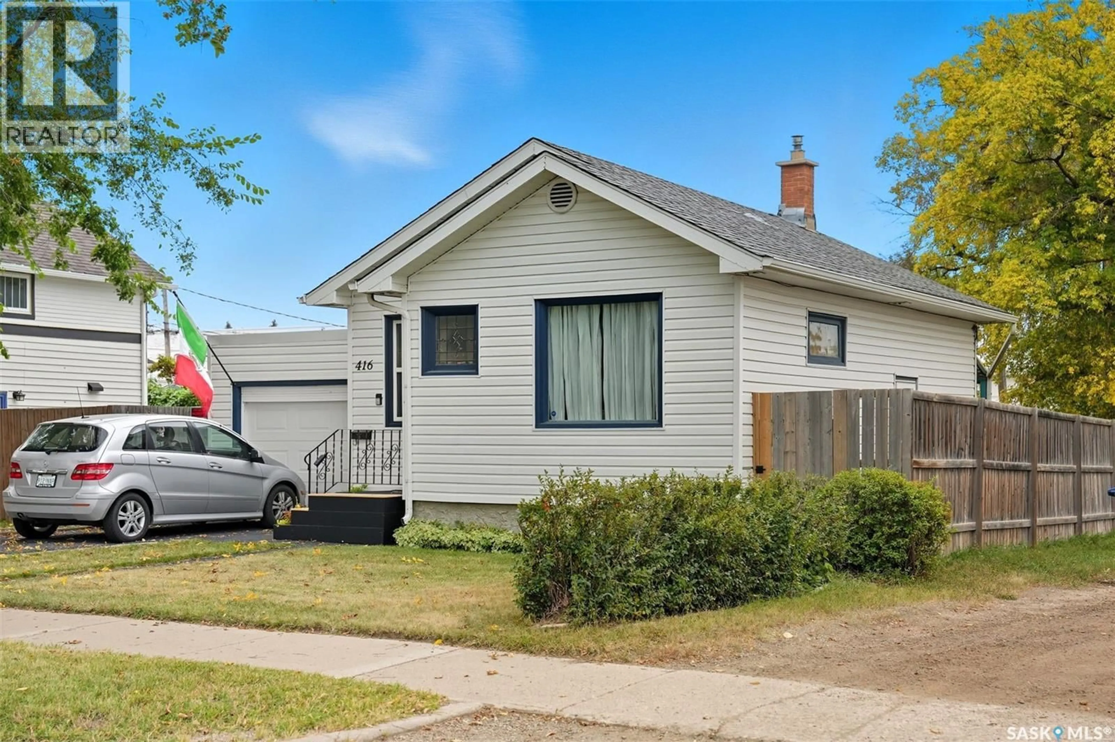 Home with vinyl exterior material, street for 416 TAYLOR STREET, Saskatoon Saskatchewan S7M0C8