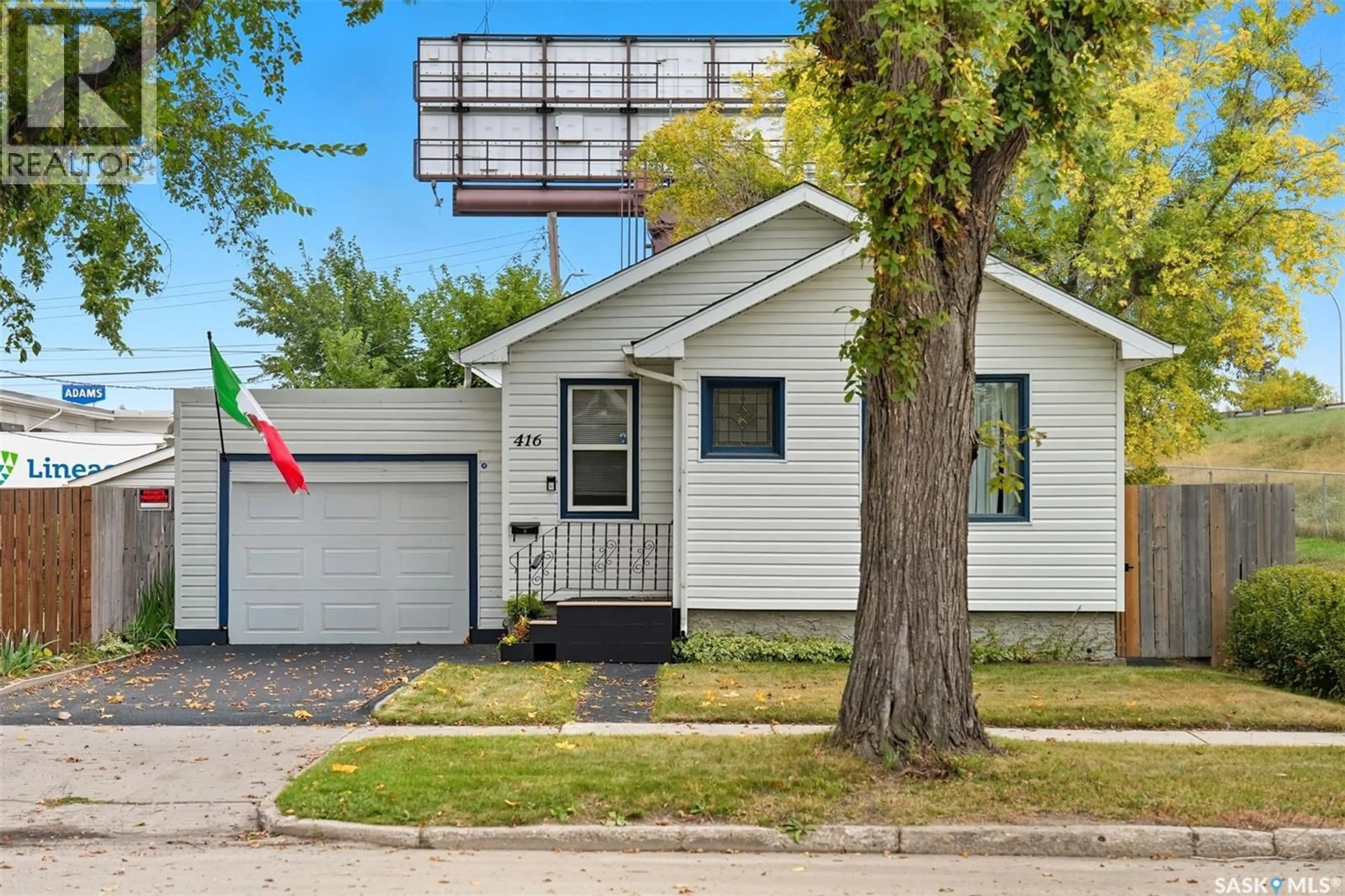Home with vinyl exterior material, street for 416 TAYLOR STREET, Saskatoon Saskatchewan S7M0C8
