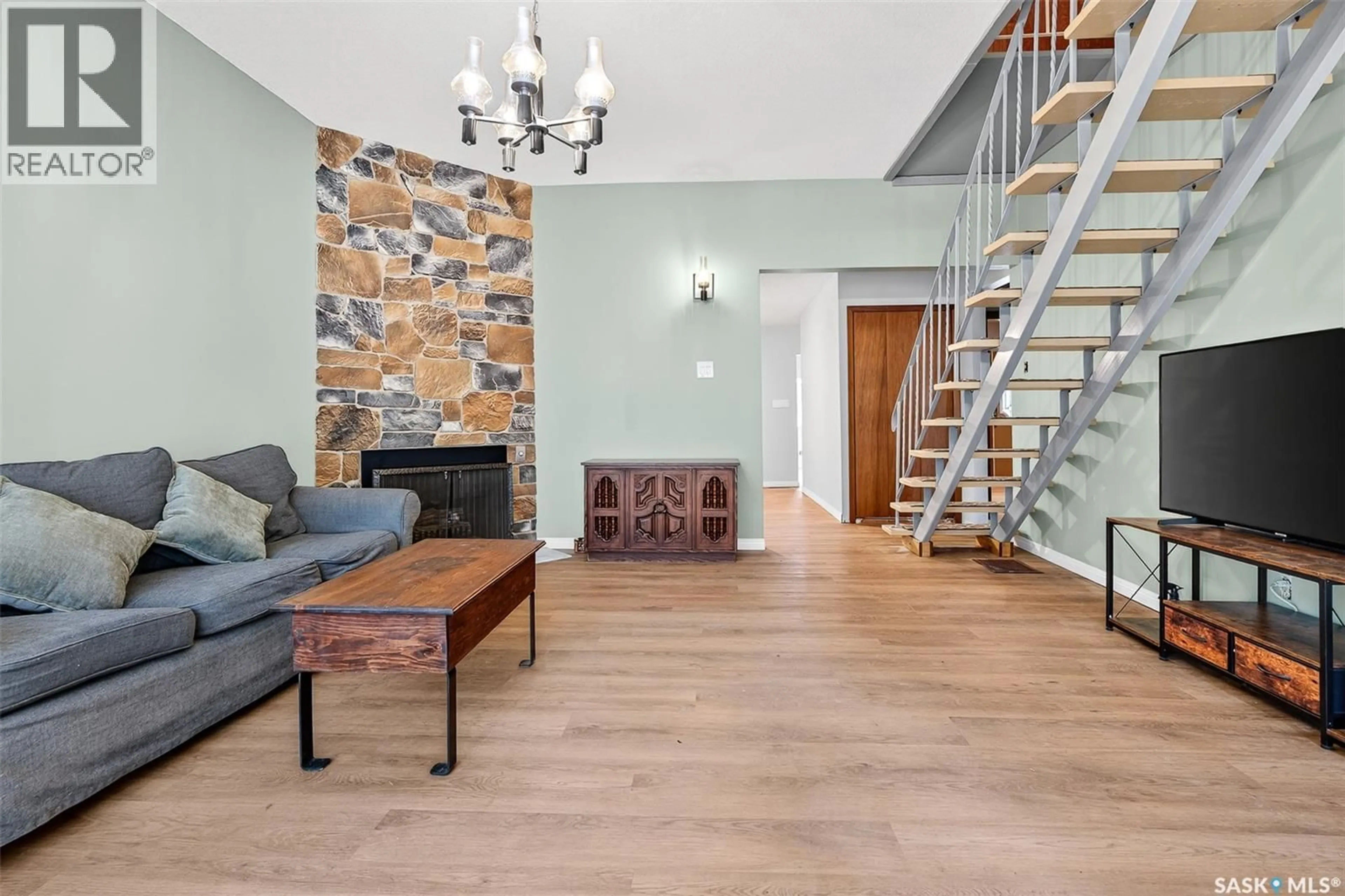 Living room with furniture, wood/laminate floor for 440 HOCHELAGA STREET, Moose Jaw Saskatchewan S6H2G9