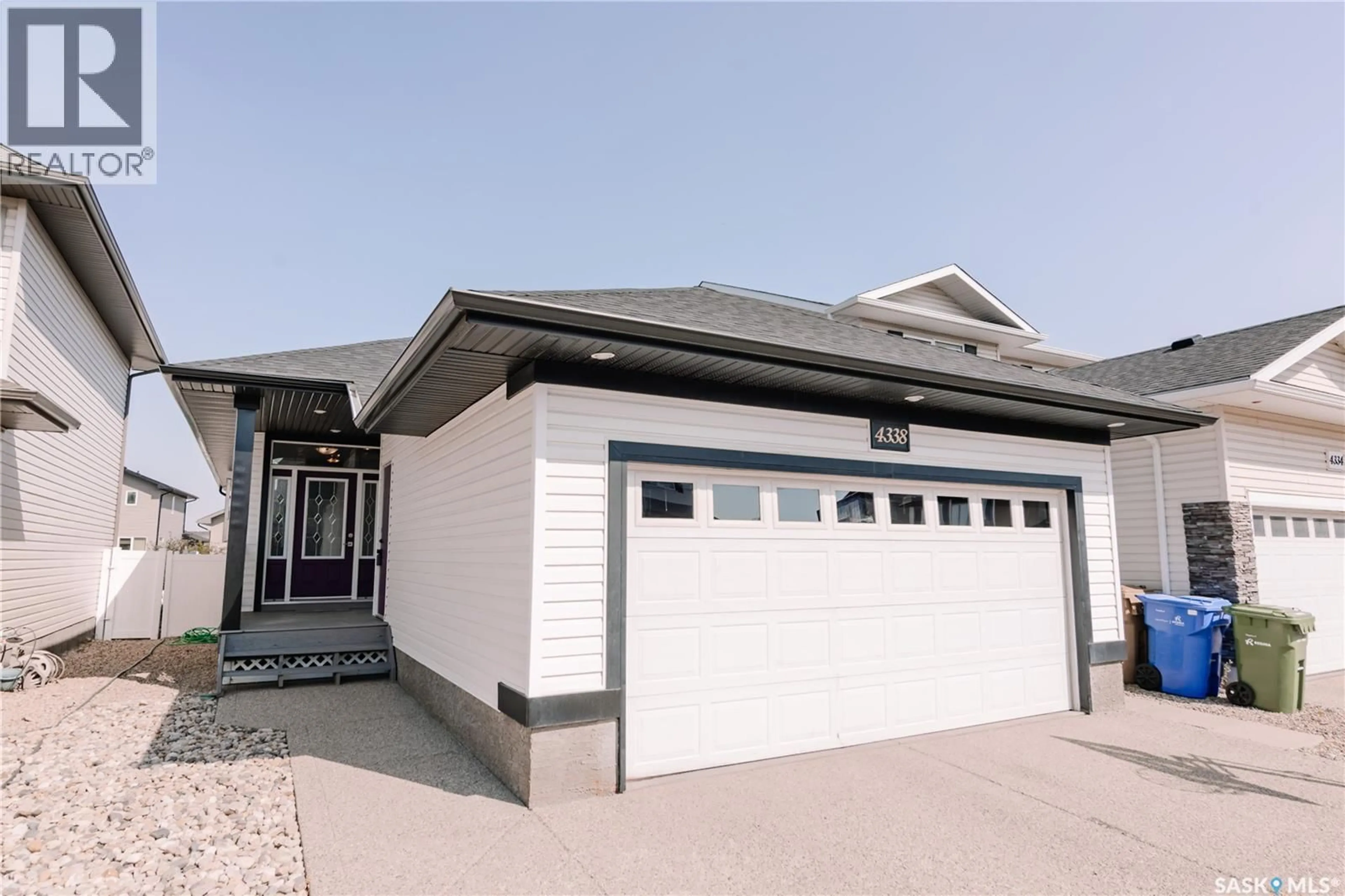 Home with vinyl exterior material, street for 4338 MEADOWSWEET LANE, Regina Saskatchewan S4X0C2