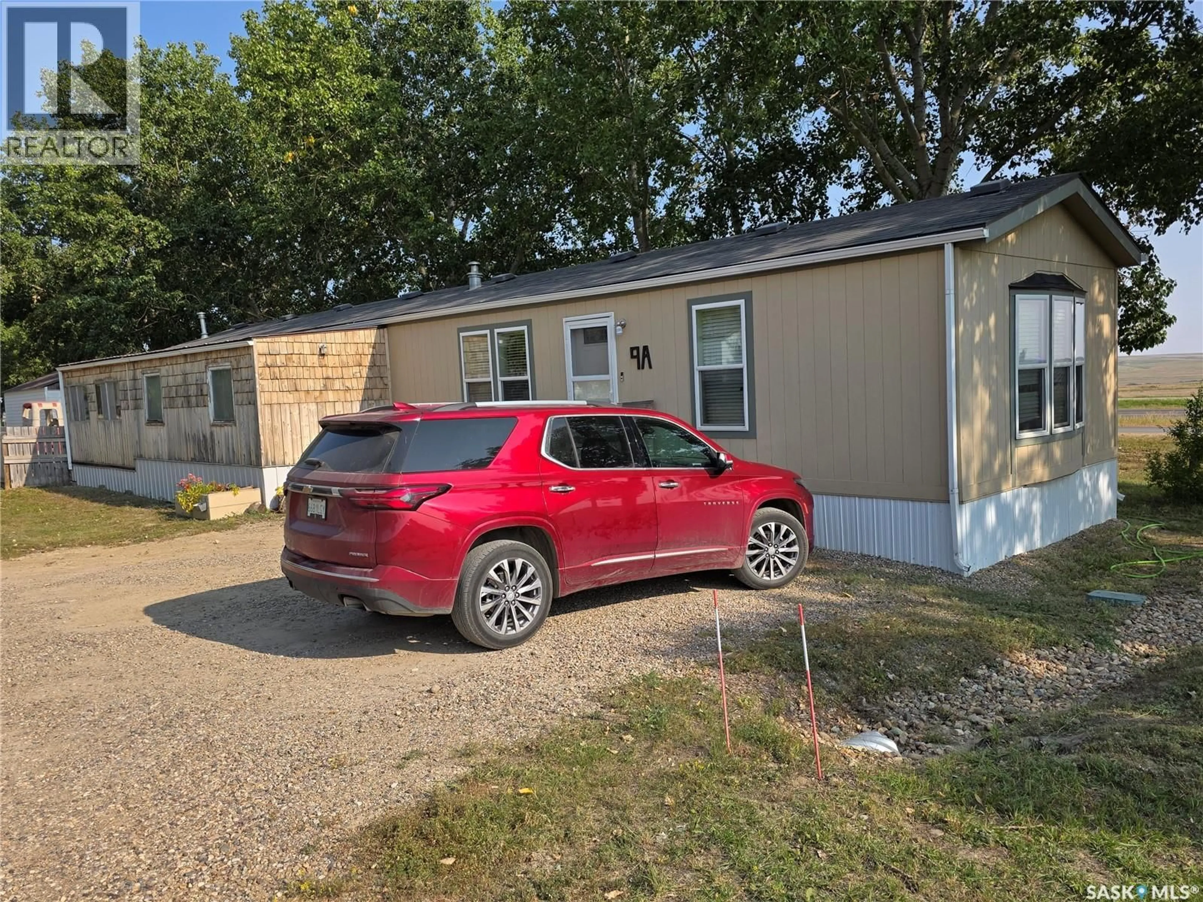A pic from outside/outdoor area/front of a property/back of a property/a pic from drone, street for 9A PRAIRIE SUN COURT, Swift Current Saskatchewan S9H3X6