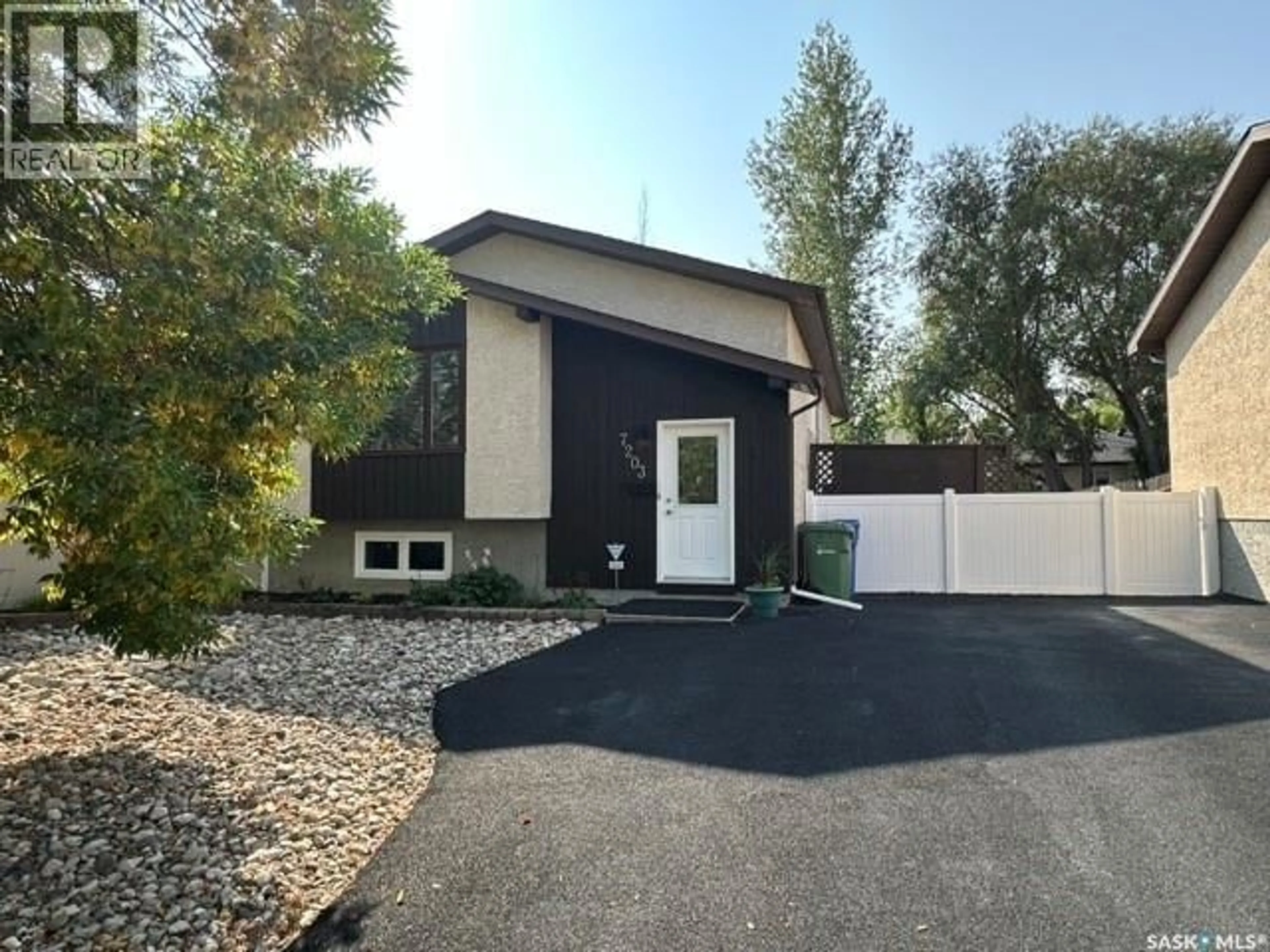 Home with vinyl exterior material, street for 7203 WHELAN DRIVE, Regina Saskatchewan S4X3W8