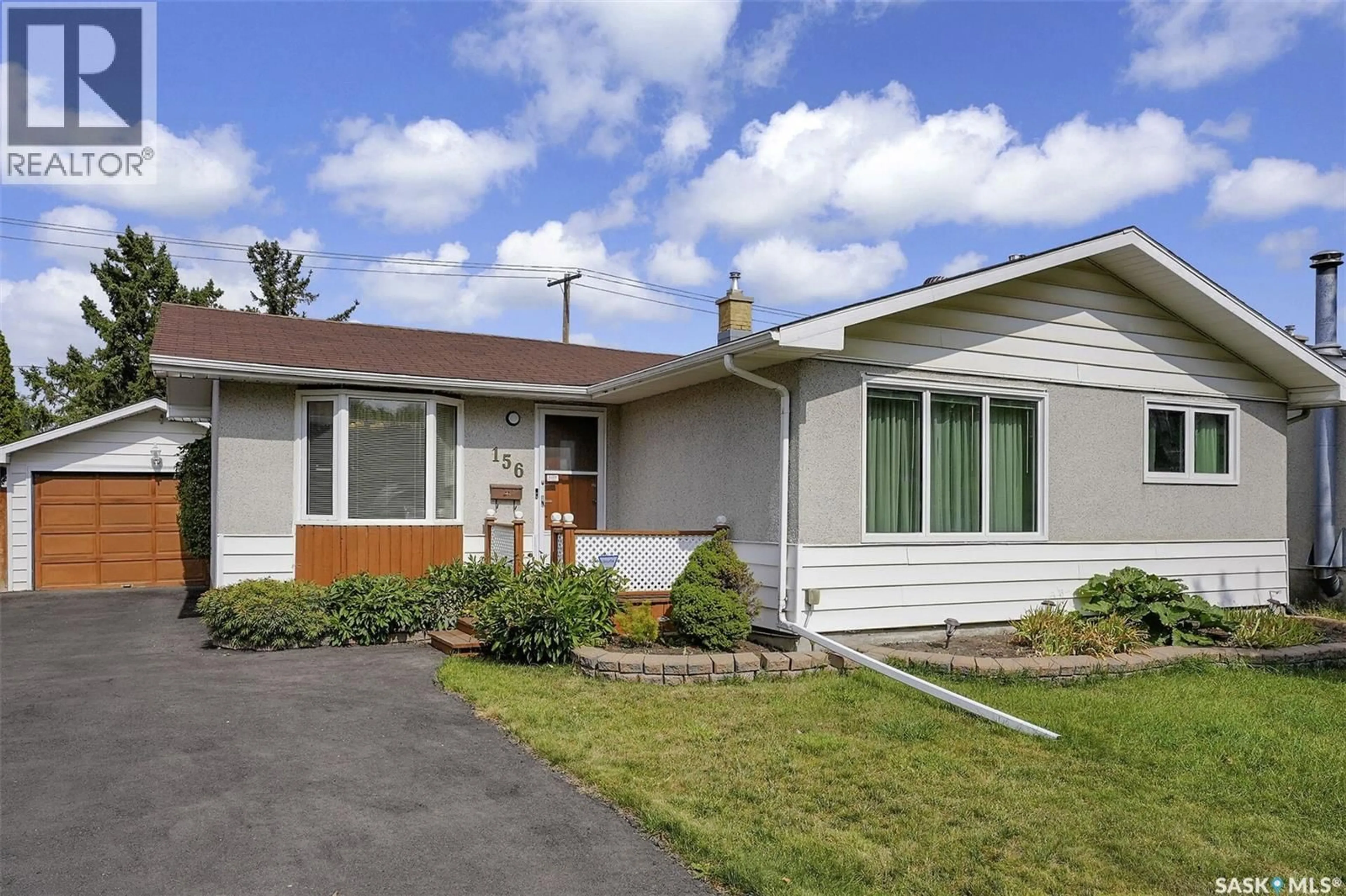 Home with vinyl exterior material, street for 156 WOODWARD AVENUE, Regina Saskatchewan S4R3H4