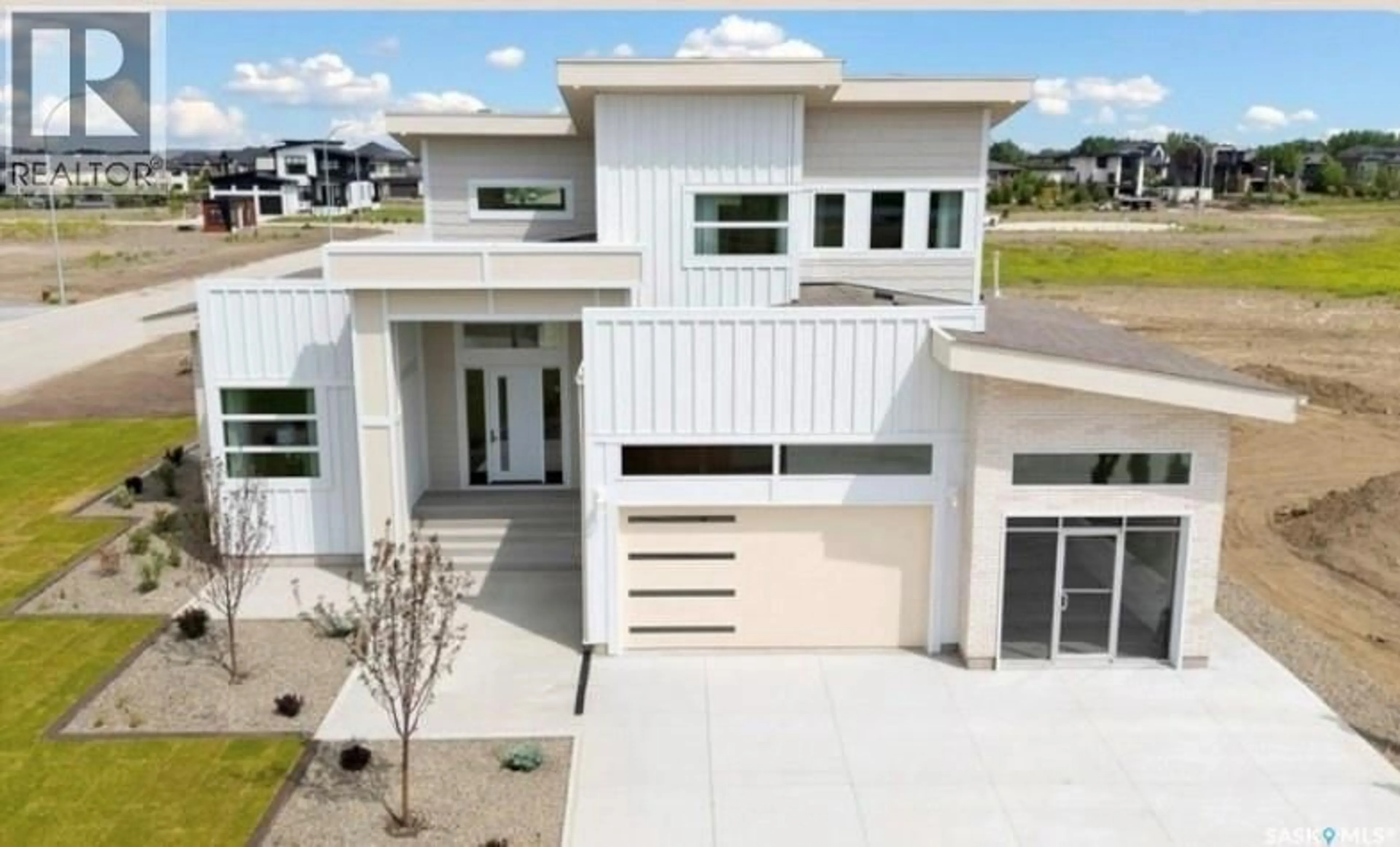Home with vinyl exterior material, street for 641 GREENBRYRE COVE, Corman Park Rm No. 344 Saskatchewan S7V0J4