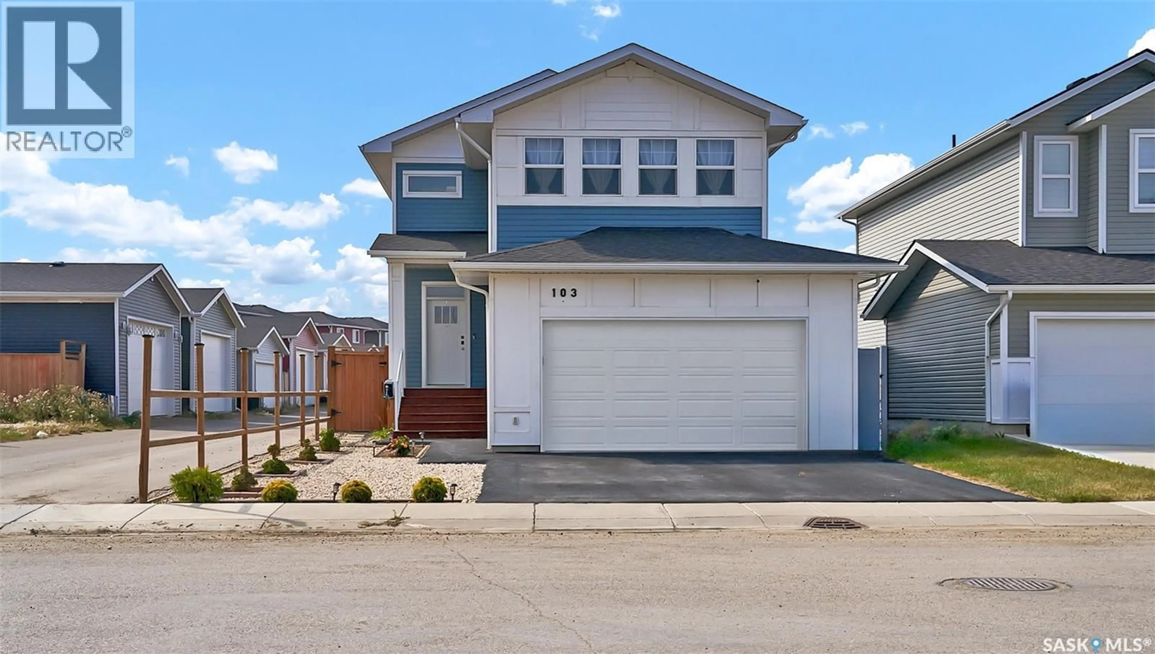 Home with vinyl exterior material, street for 103 STROMBERG CRESCENT, Saskatoon Saskatchewan S7L7C4