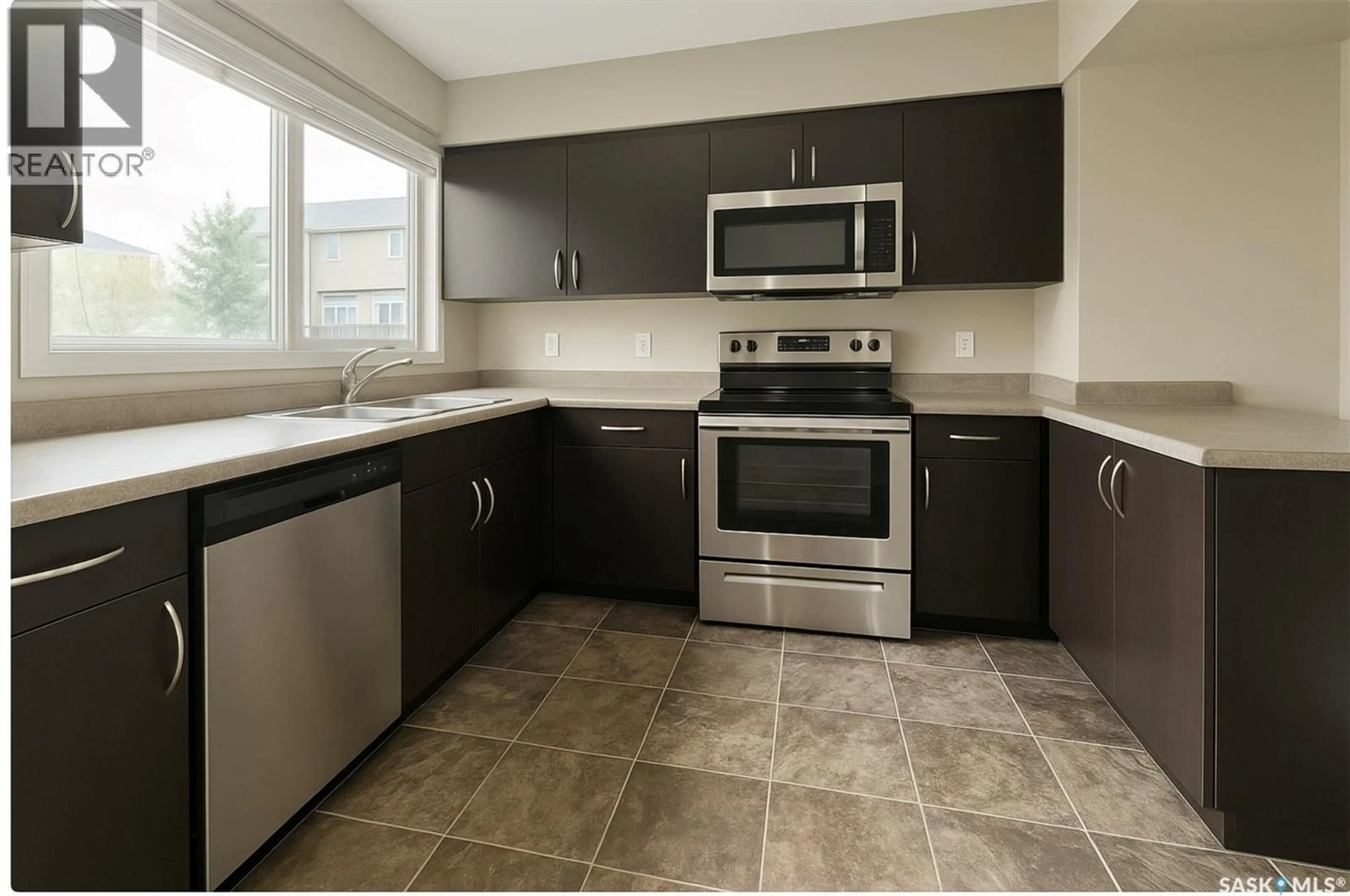 Standard kitchen, ceramic/tile floor for 4 315 N AVENUE, Saskatoon Saskatchewan S7M2N2
