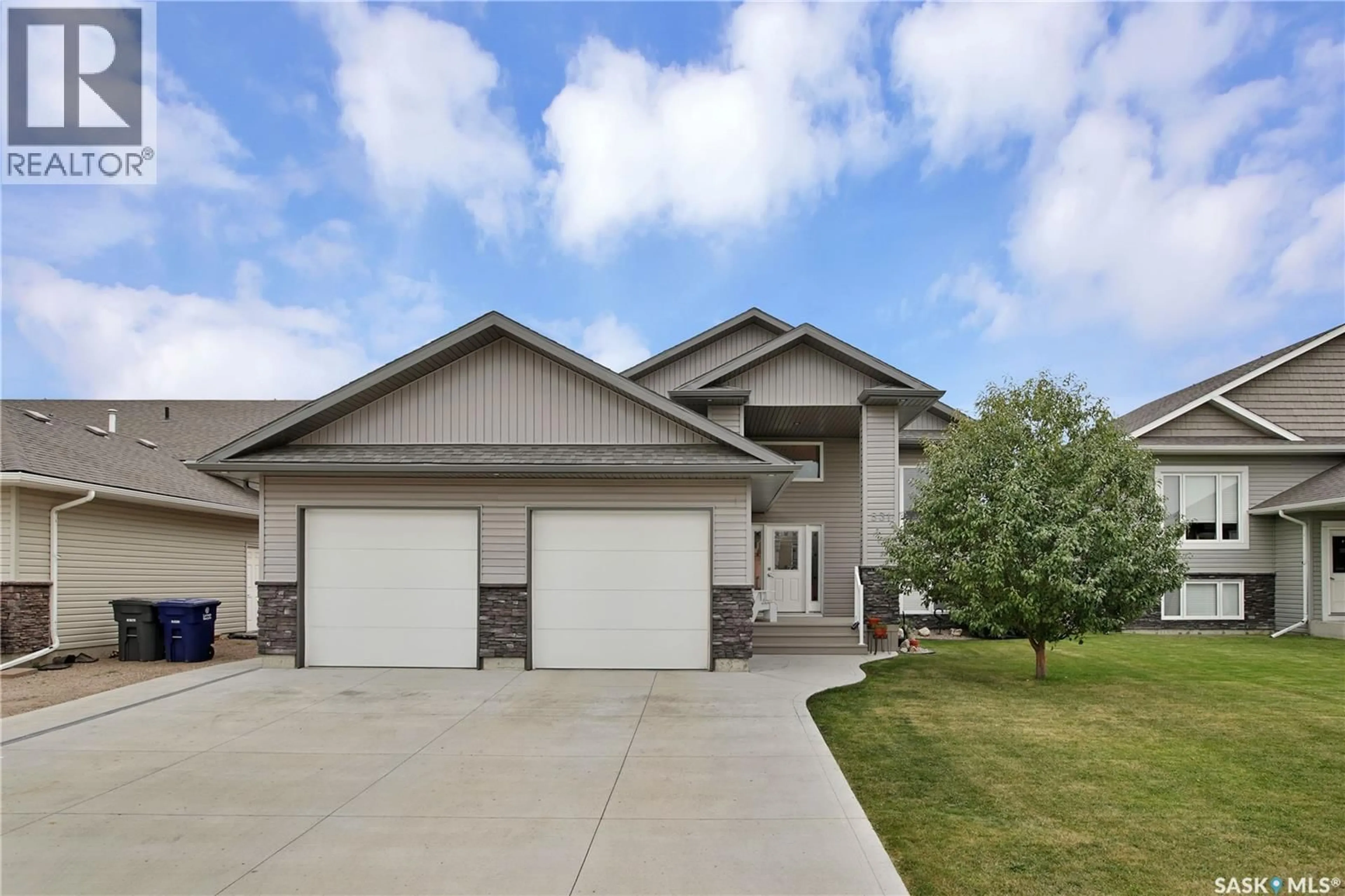 Home with vinyl exterior material, street for 531 PALMER CRESCENT, Warman Saskatchewan S0K4S1