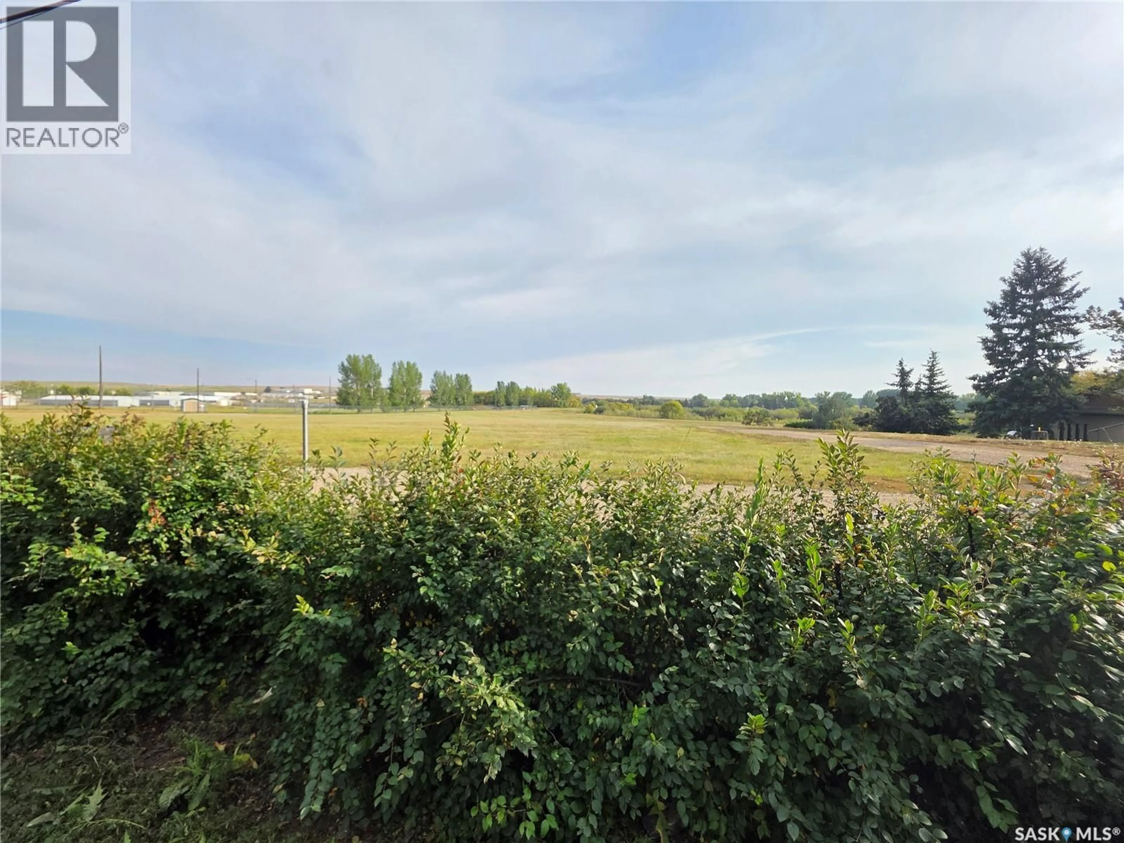 A pic from outside/outdoor area/front of a property/back of a property/a pic from drone, forest/trees view for 1200 DAHL STREET, Swift Current Saskatchewan S9H3Z3