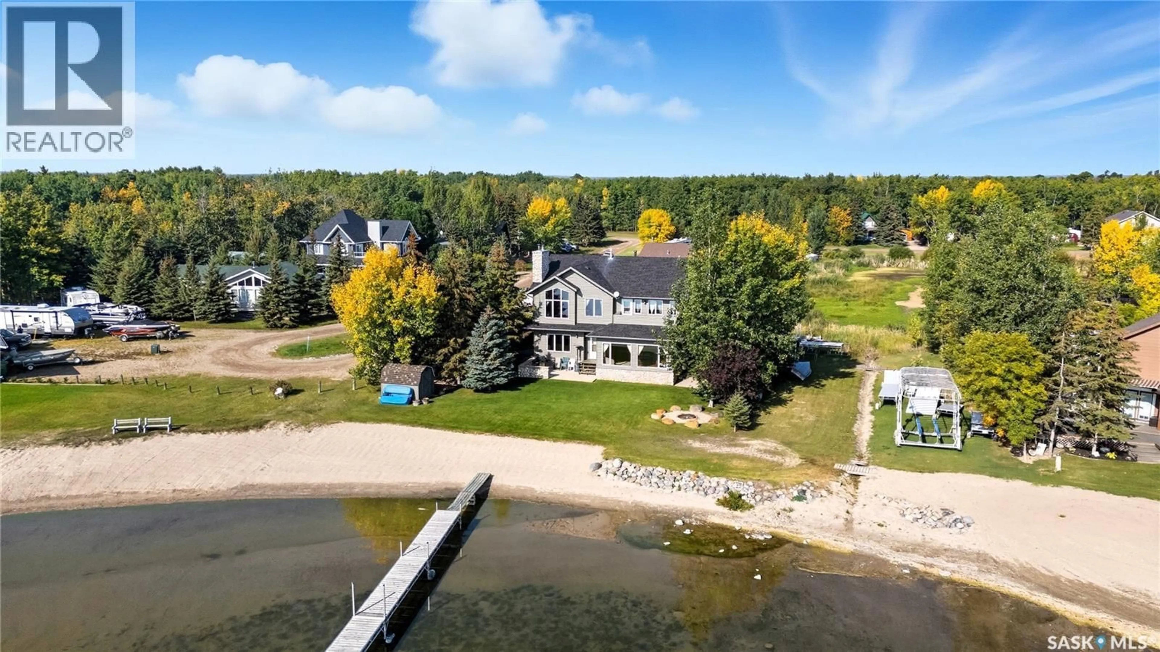 A pic from outside/outdoor area/front of a property/back of a property/a pic from drone, water/lake/river/ocean view for 213 POPLAR PLACE, Turtle Lake Saskatchewan S0M2Y0