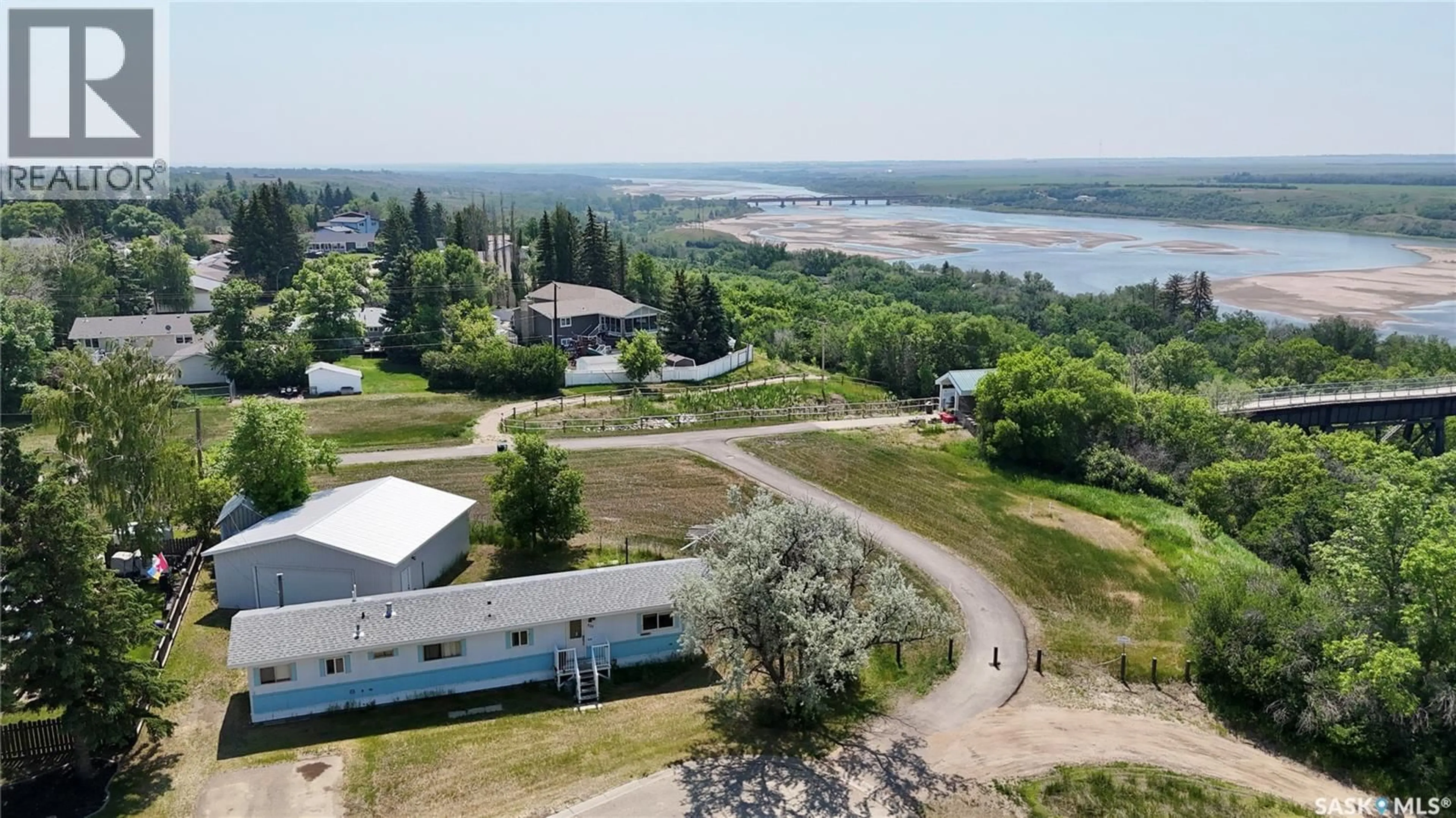 A pic from outside/outdoor area/front of a property/back of a property/a pic from drone, water/lake/river/ocean view for 525 PARK AVENUE, Outlook Saskatchewan S0L2N0