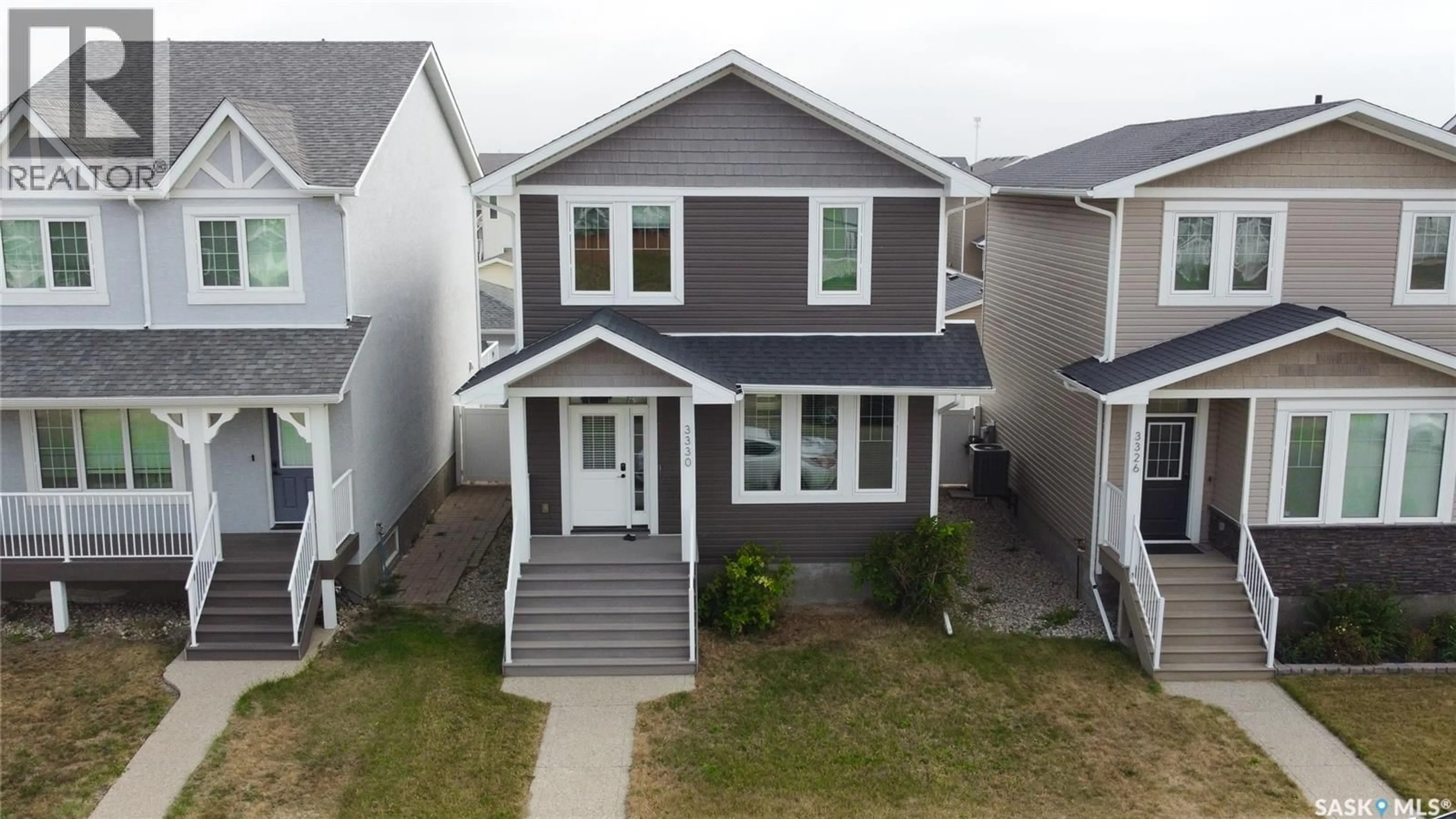 Home with vinyl exterior material, street for 3330 ELGAARD DRIVE, Regina Saskatchewan S4R8J6