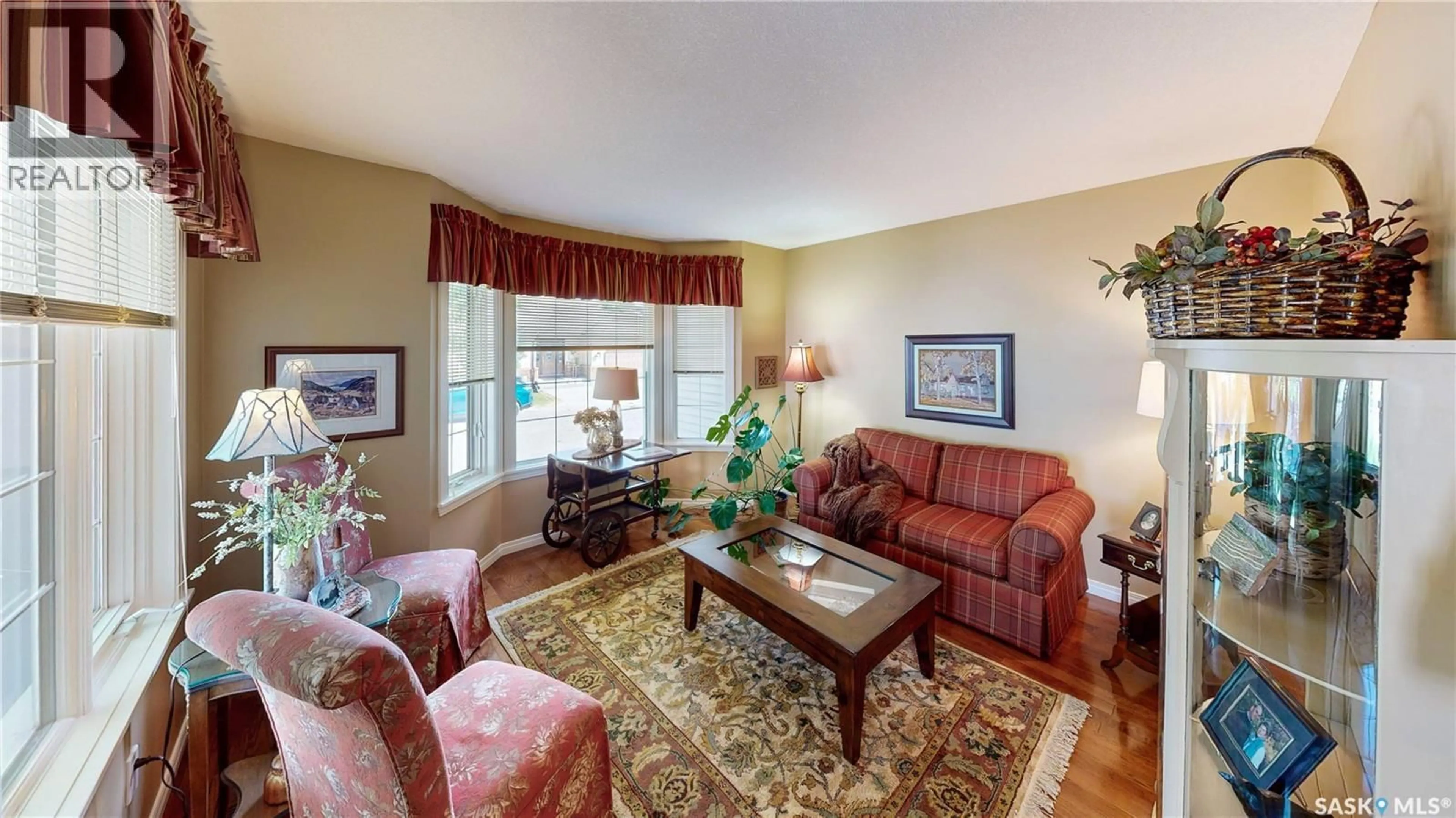 Living room with furniture, unknown for 16 WINTERGREEN BAY, Regina Saskatchewan S4S7G2