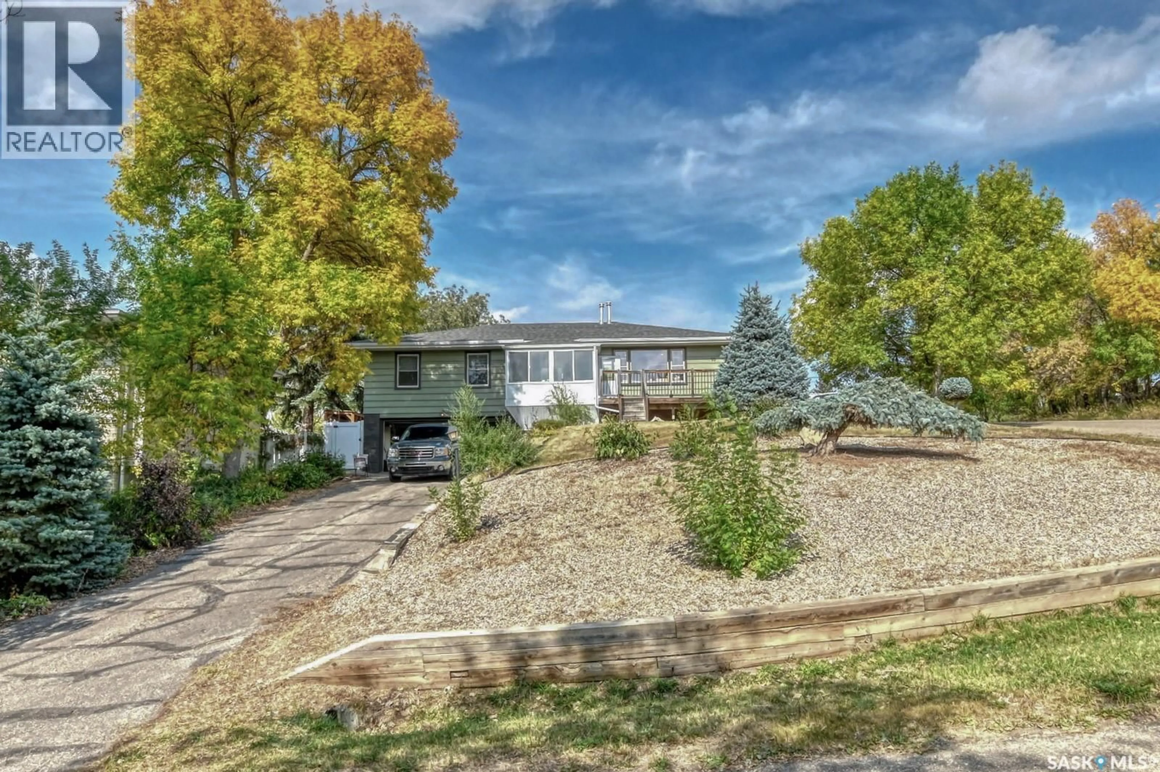 A pic from outside/outdoor area/front of a property/back of a property/a pic from drone, unknown for 70 PETER AVENUE, Lumsden Saskatchewan S0G3C0