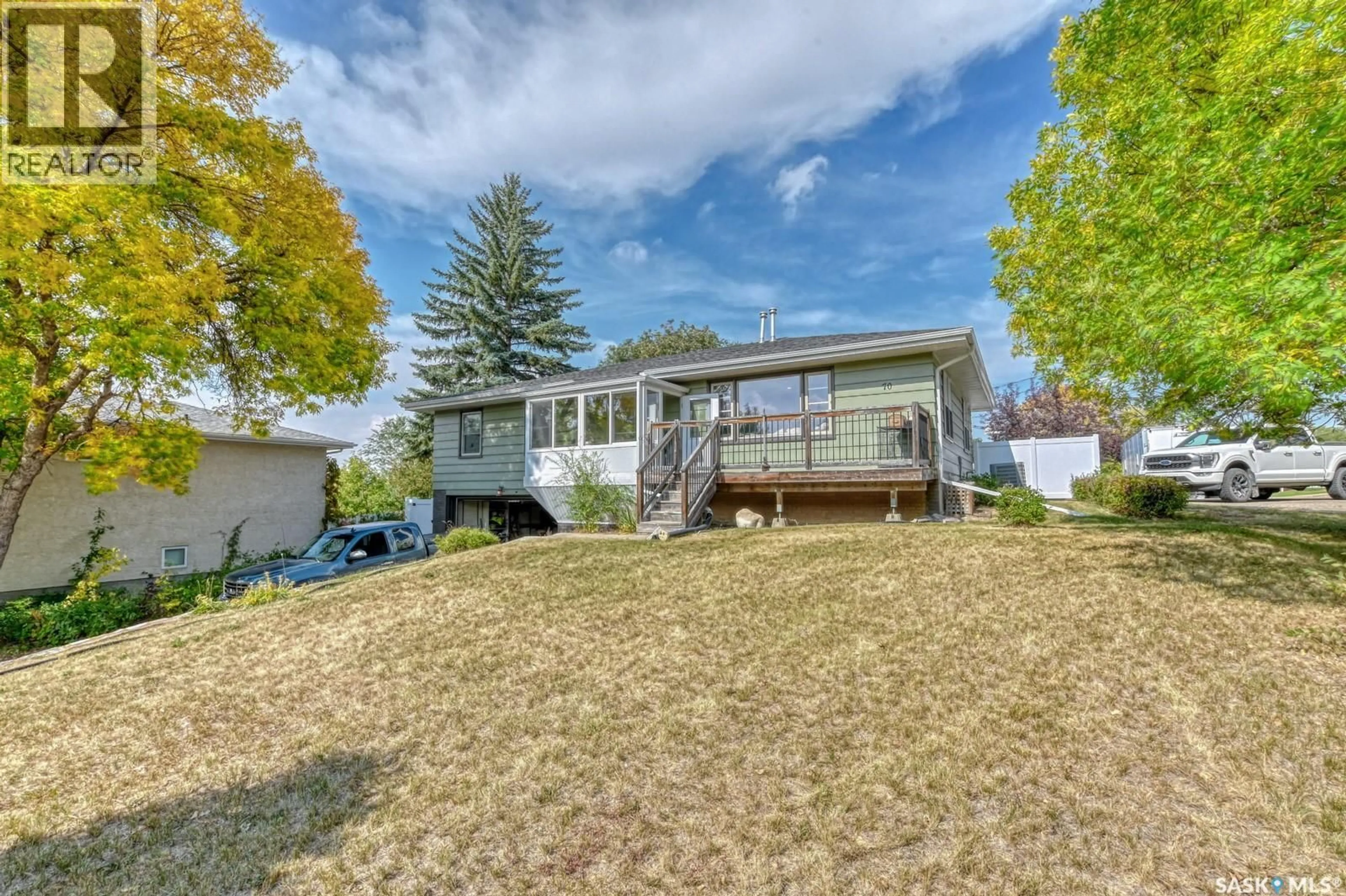 A pic from outside/outdoor area/front of a property/back of a property/a pic from drone, unknown for 70 PETER AVENUE, Lumsden Saskatchewan S0G3C0