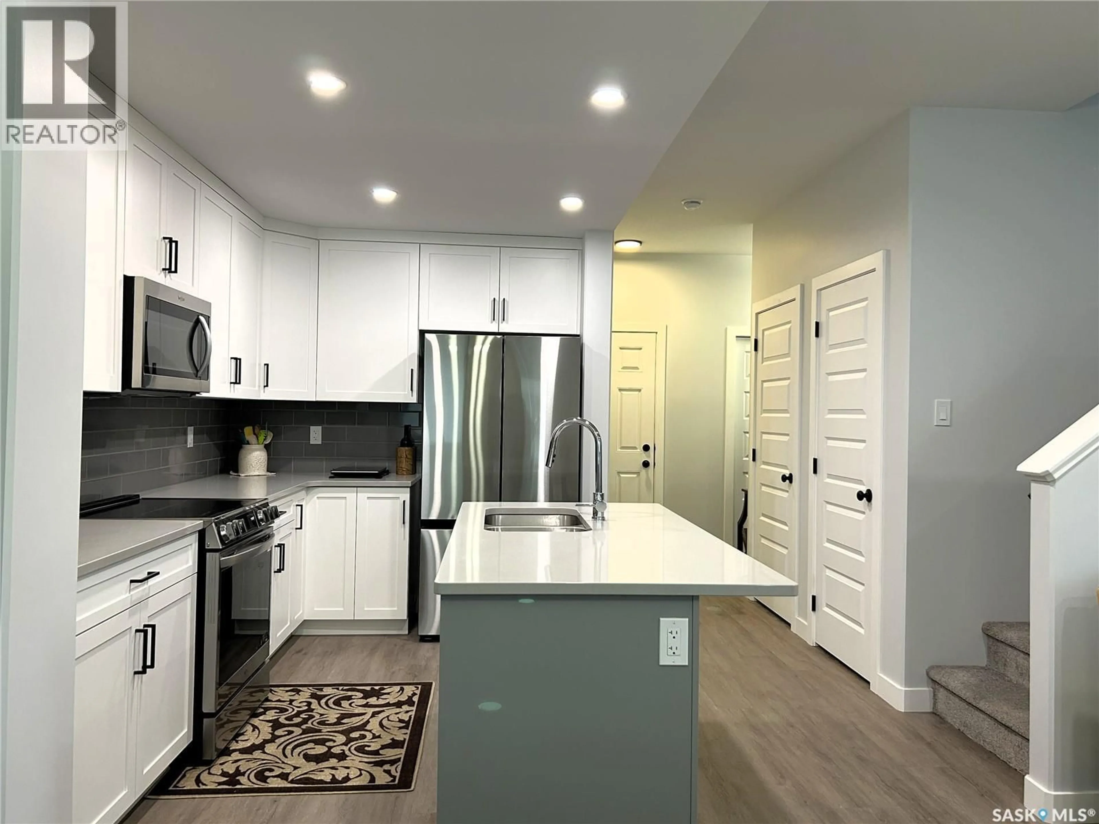 Open concept kitchen, unknown for 115 - 9 FEHEREGYHAZI BOULEVARD, Saskatoon Saskatchewan S7W1J6