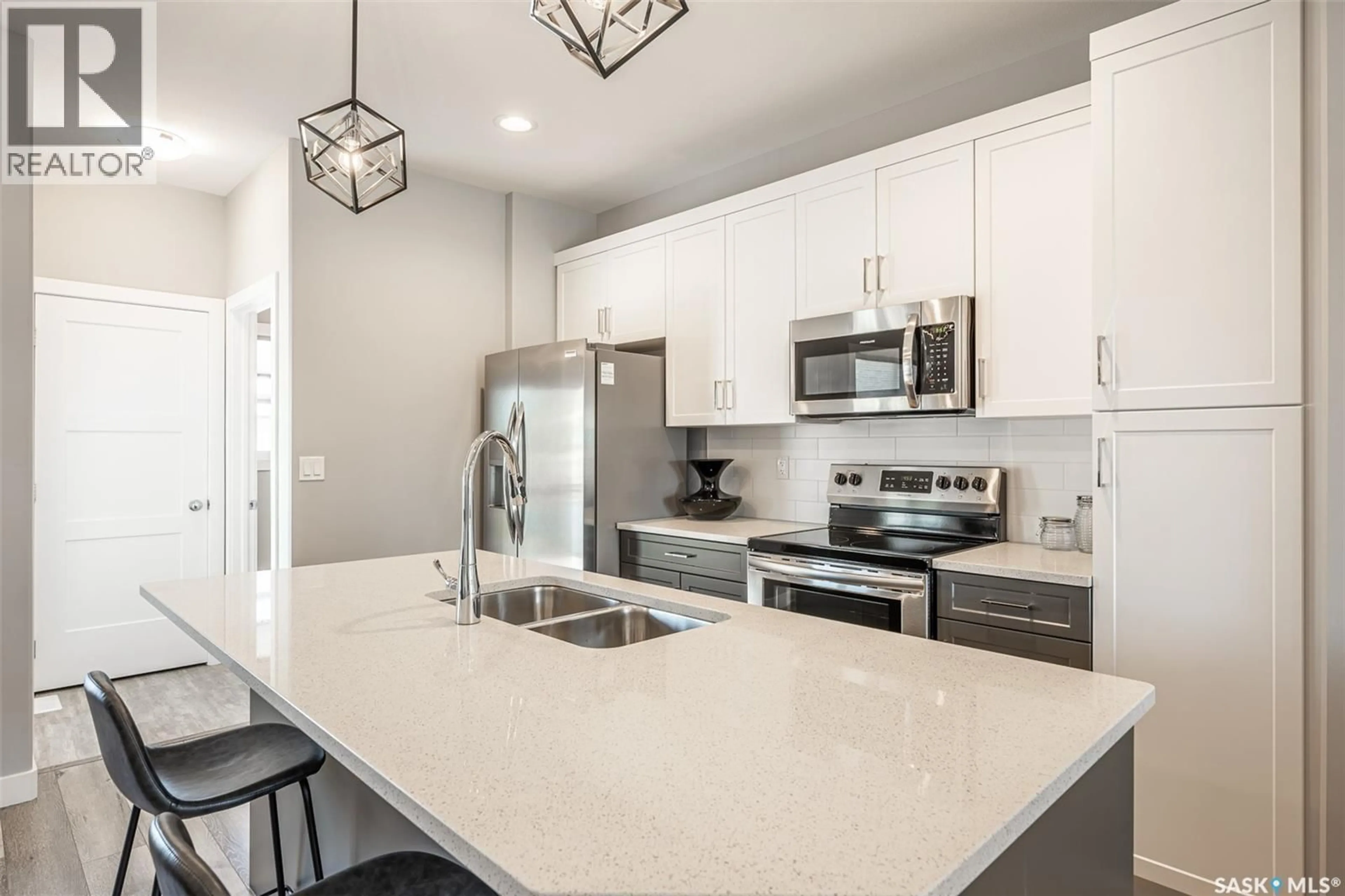Open concept kitchen, ceramic/tile floor for 346 COWESSESS ROAD, Saskatoon Saskatchewan S7V1Y4