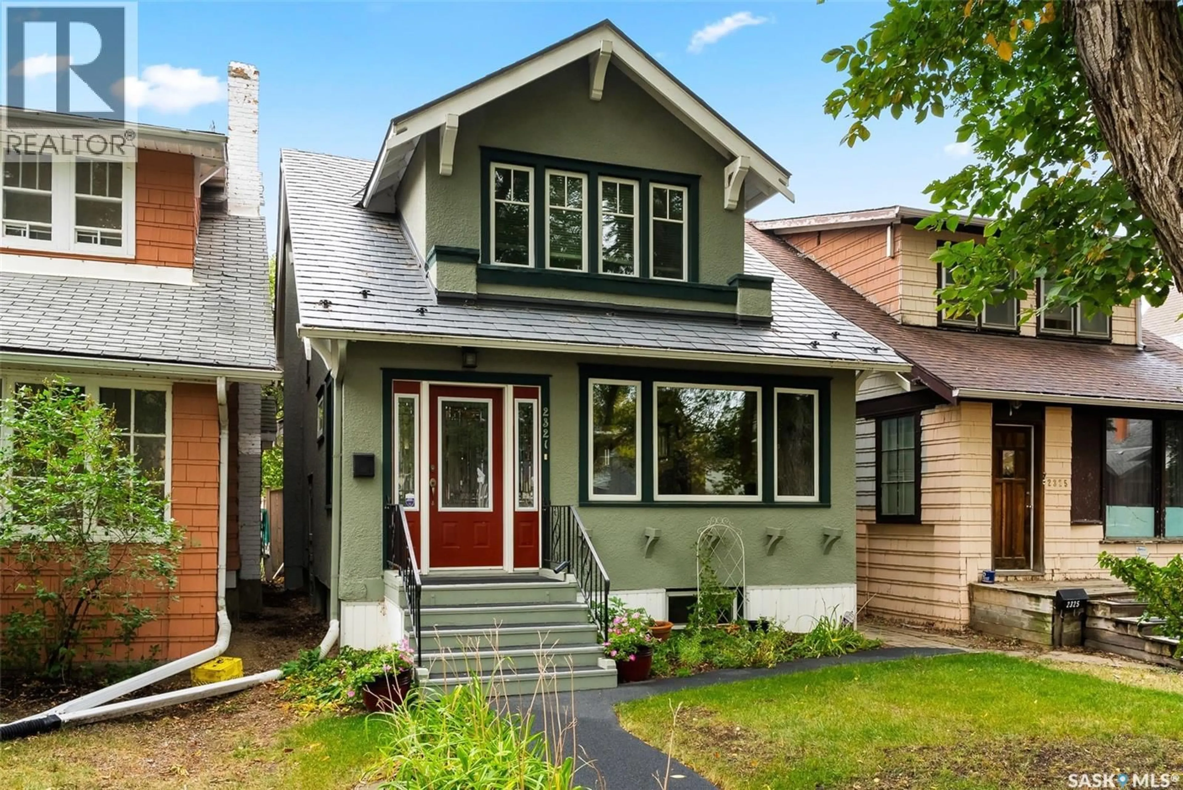 Home with vinyl exterior material, street for 2321 ST JOHN STREET, Regina Saskatchewan S4P1S7