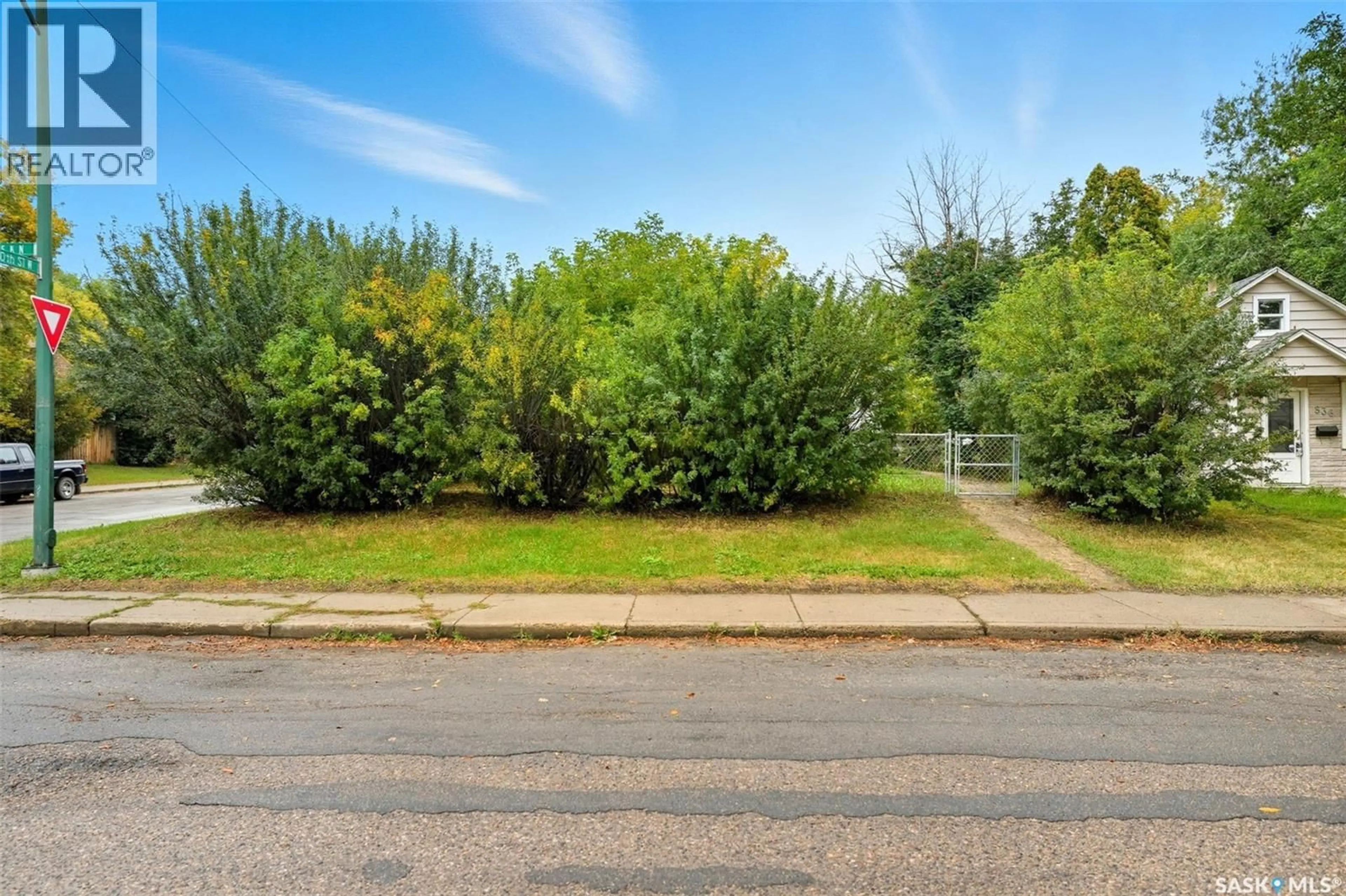 A pic from outside/outdoor area/front of a property/back of a property/a pic from drone, forest/trees view for 838 K AVENUE, Saskatoon Saskatchewan S7L2N1