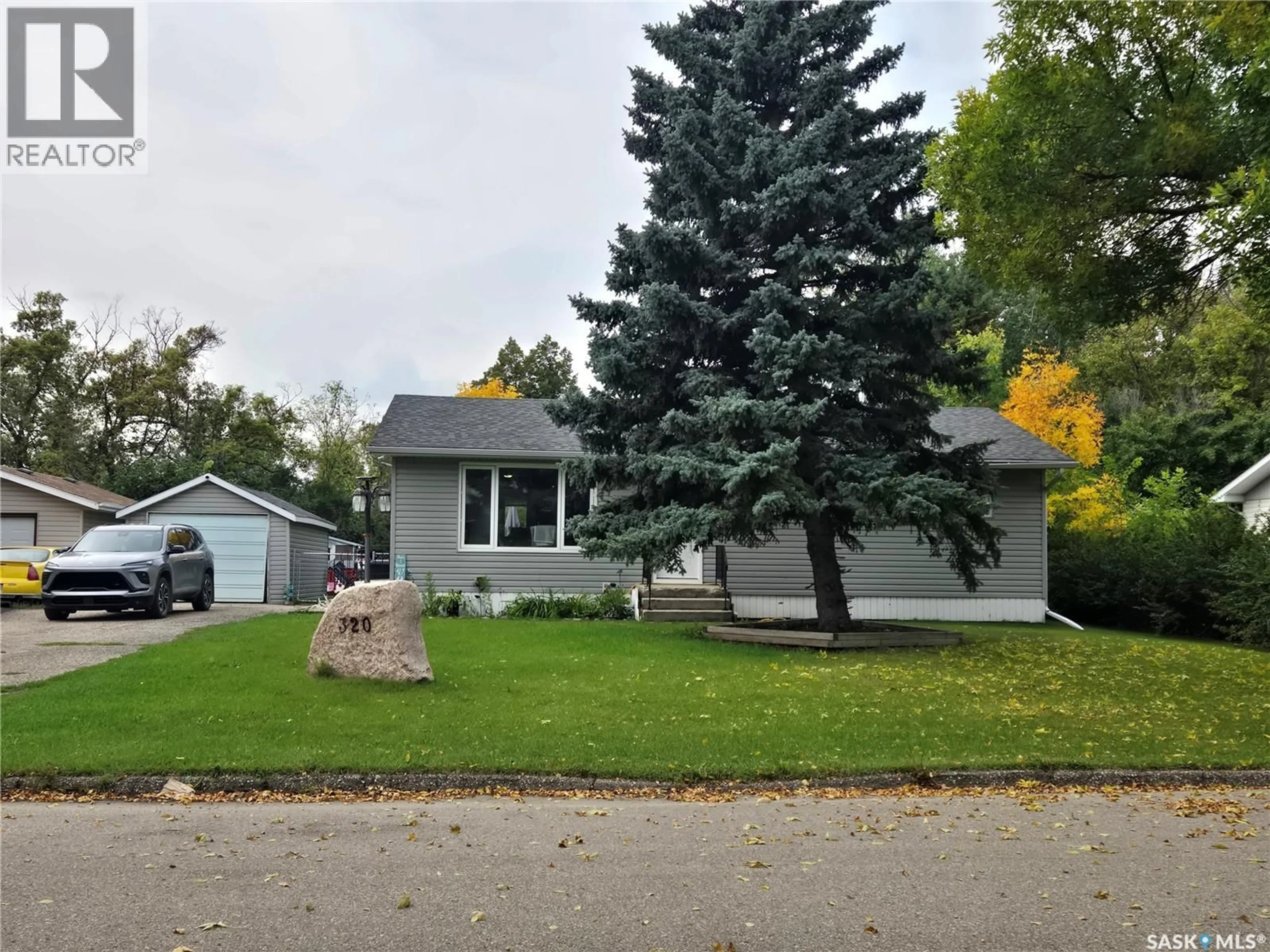 Home with vinyl exterior material, street for 320 RUSSELL STREET, Stoughton Saskatchewan S0G4T0
