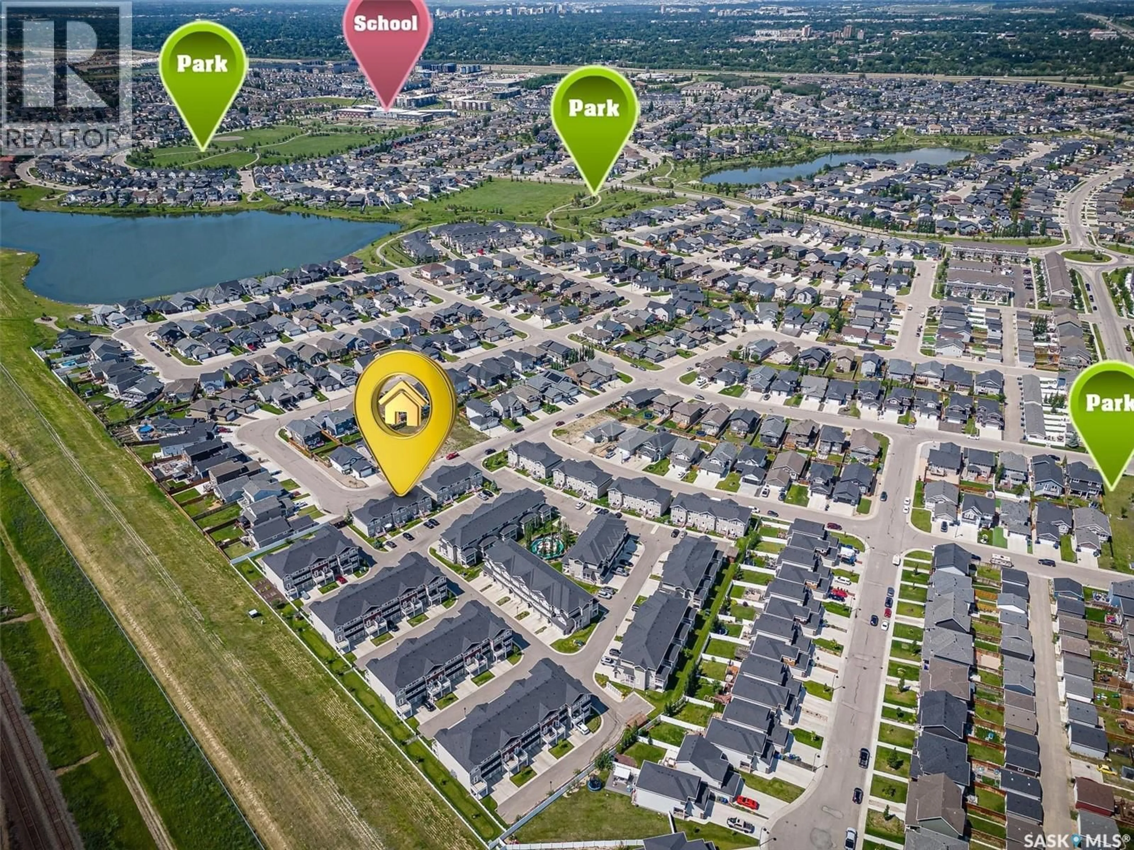 A pic from outside/outdoor area/front of a property/back of a property/a pic from drone, street for 1214 PRINGLE WAY, Saskatoon Saskatchewan S7T0X5