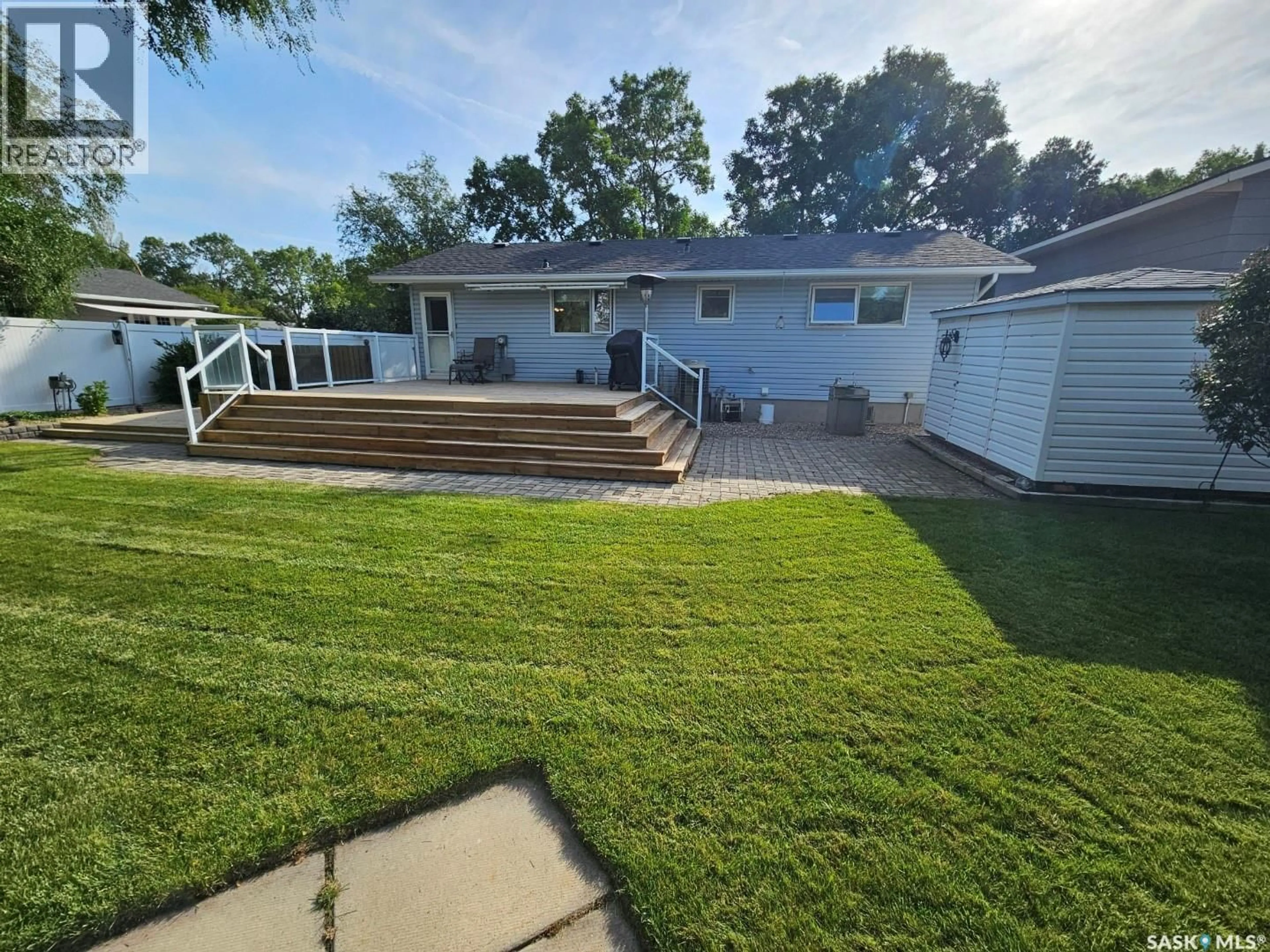 A pic from outside/outdoor area/front of a property/back of a property/a pic from drone, water/lake/river/ocean view for 235 17TH STREET, Weyburn Saskatchewan S4H2P1