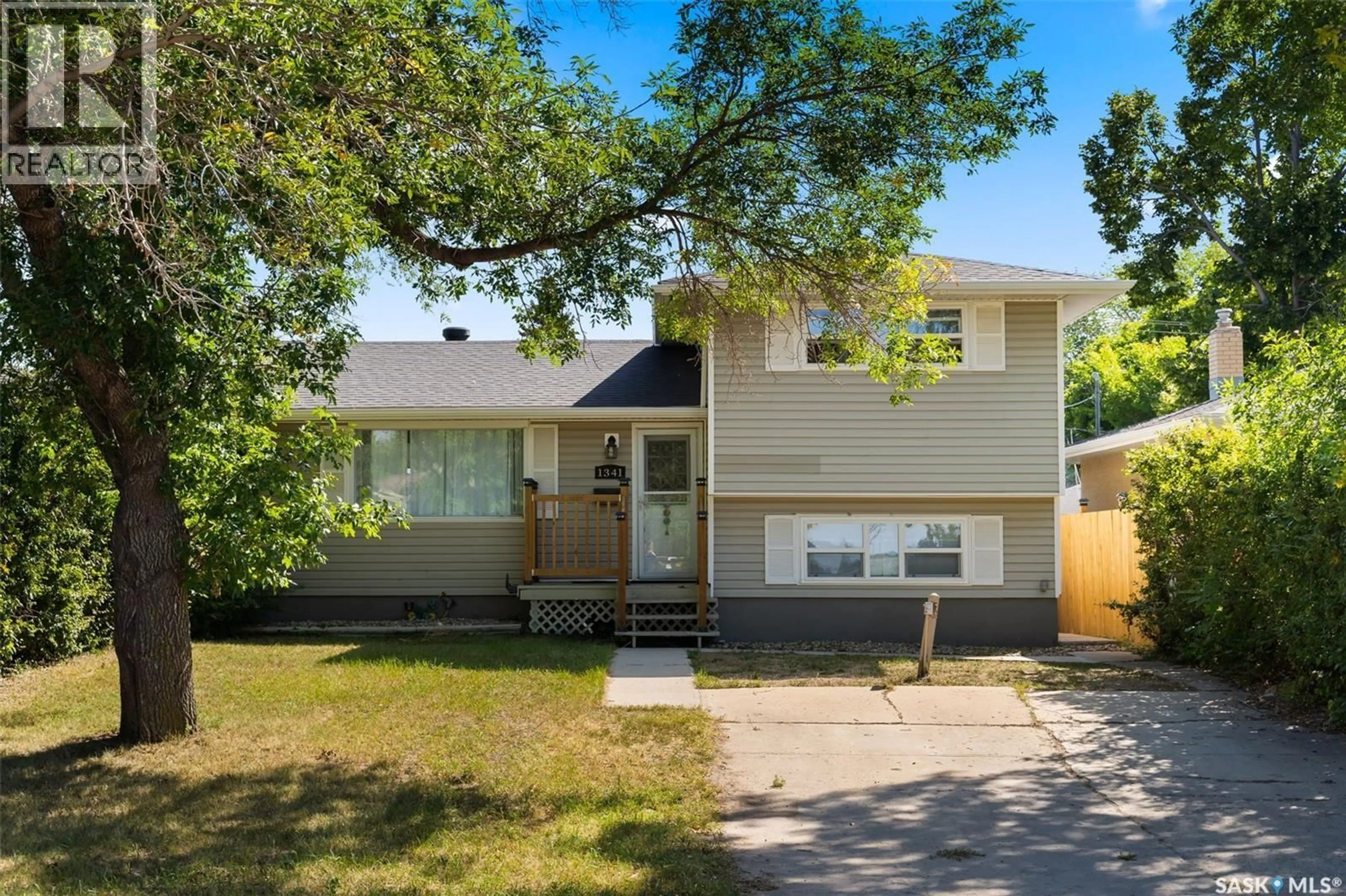 Home with vinyl exterior material, street for 1341 9TH AVENUE, Regina Saskatchewan S4R0E6