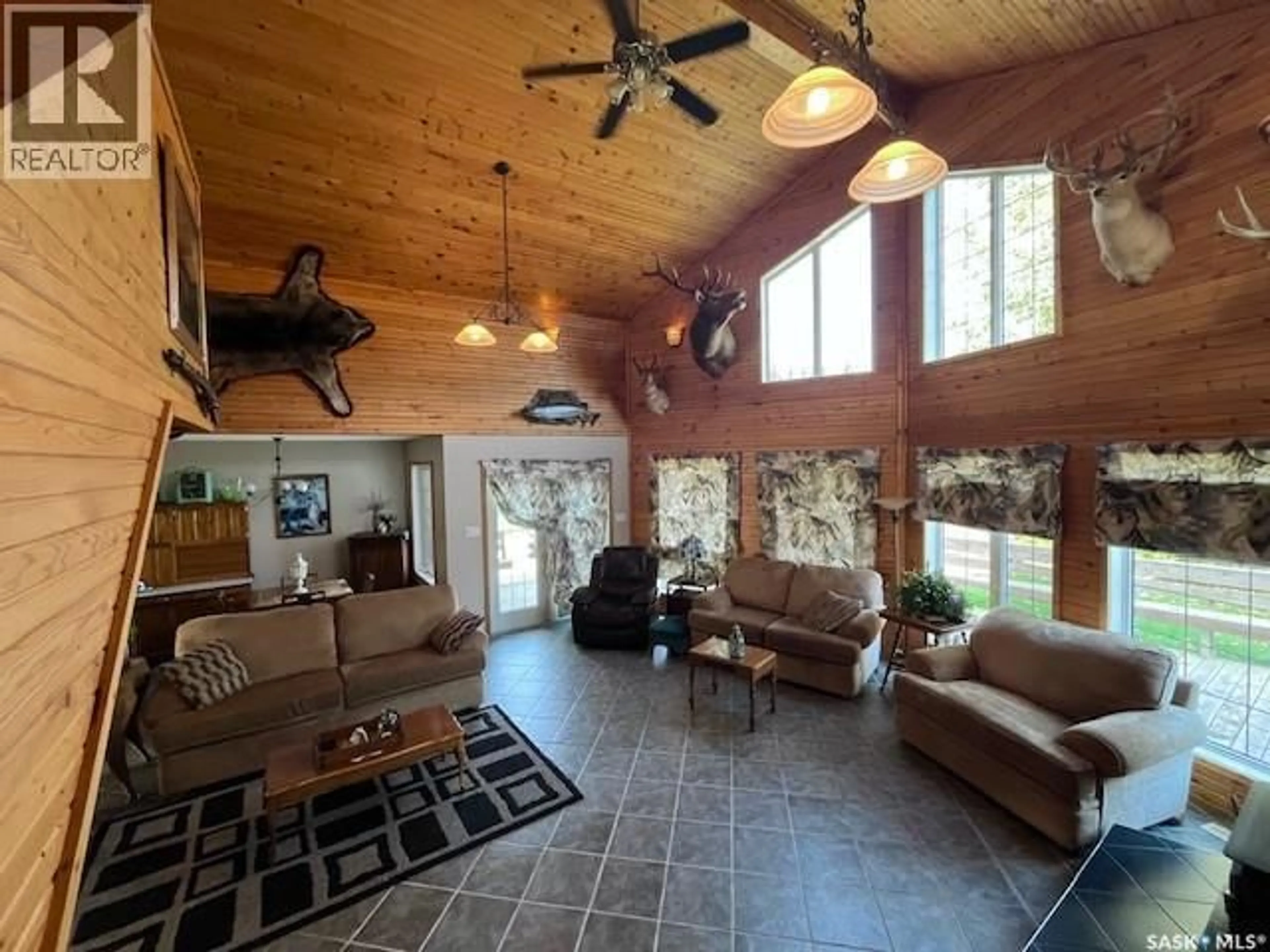 Living room with furniture, unknown for 109 NORTHERN MEADOWS DRIVE, Beaver River Rm No. 622 Saskatchewan S0M1A0