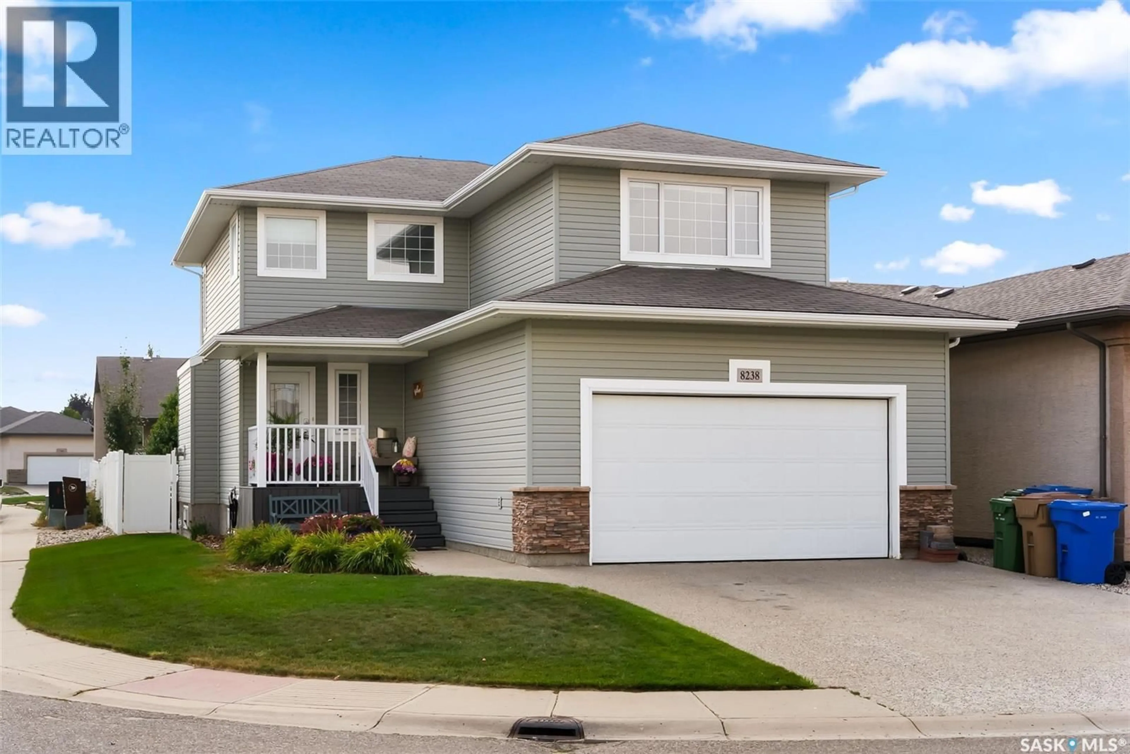 Home with vinyl exterior material, street for 8238 FAIRWAYS WEST DRIVE, Regina Saskatchewan S4Y0A1