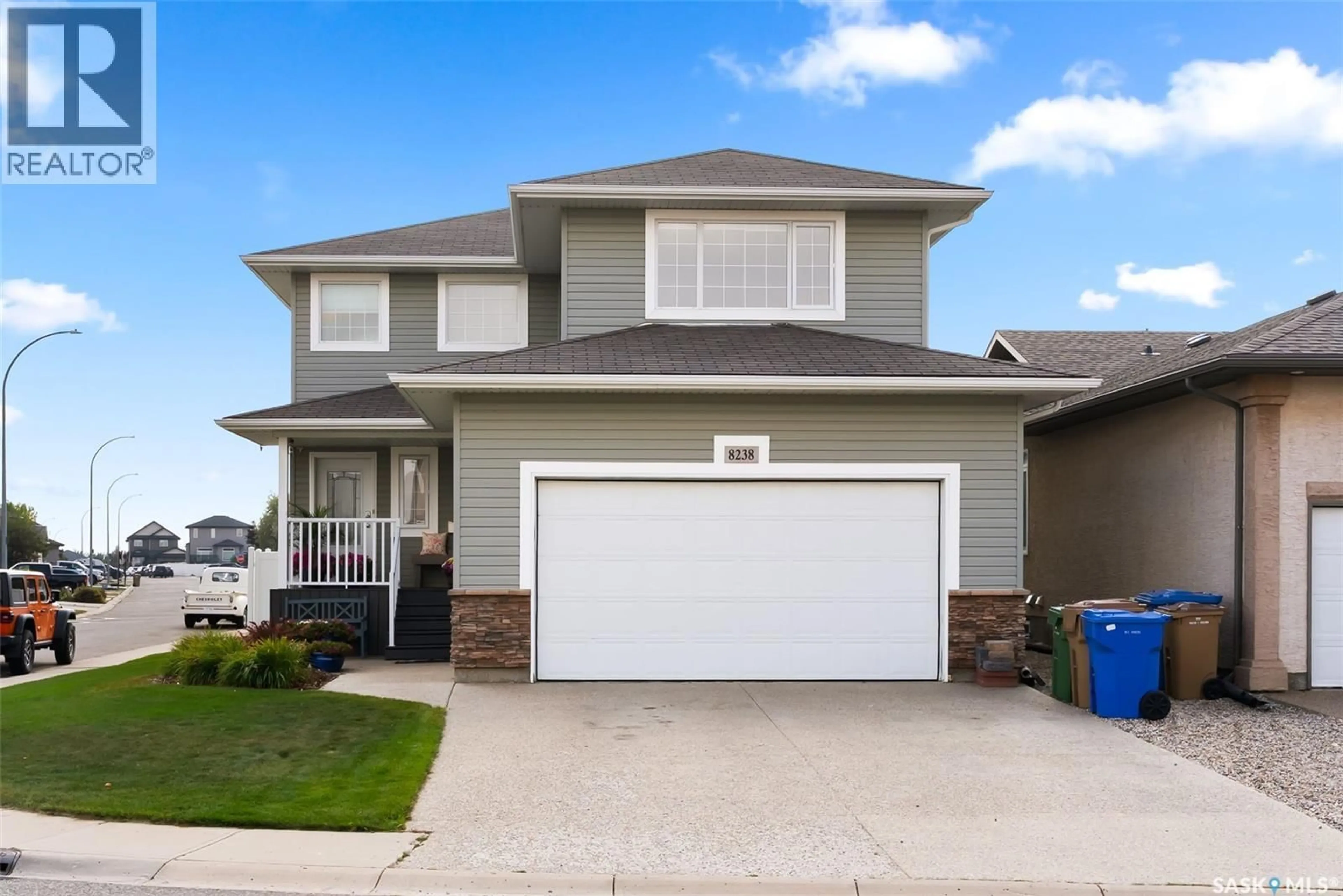 Home with vinyl exterior material, street for 8238 FAIRWAYS WEST DRIVE, Regina Saskatchewan S4Y0A1