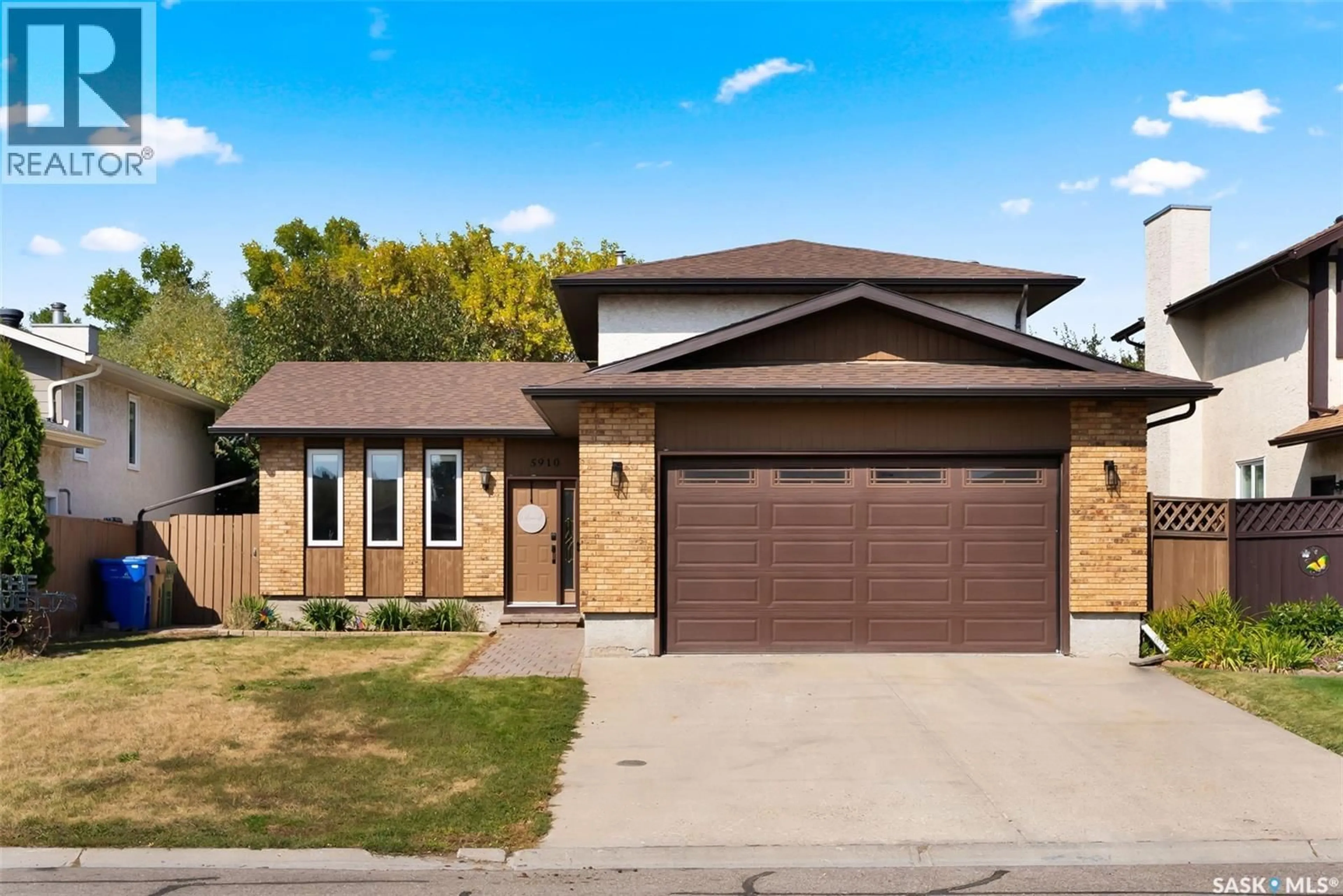 Home with brick exterior material, street for 5910 STEELE CRESCENT, Regina Saskatchewan S4X4A9