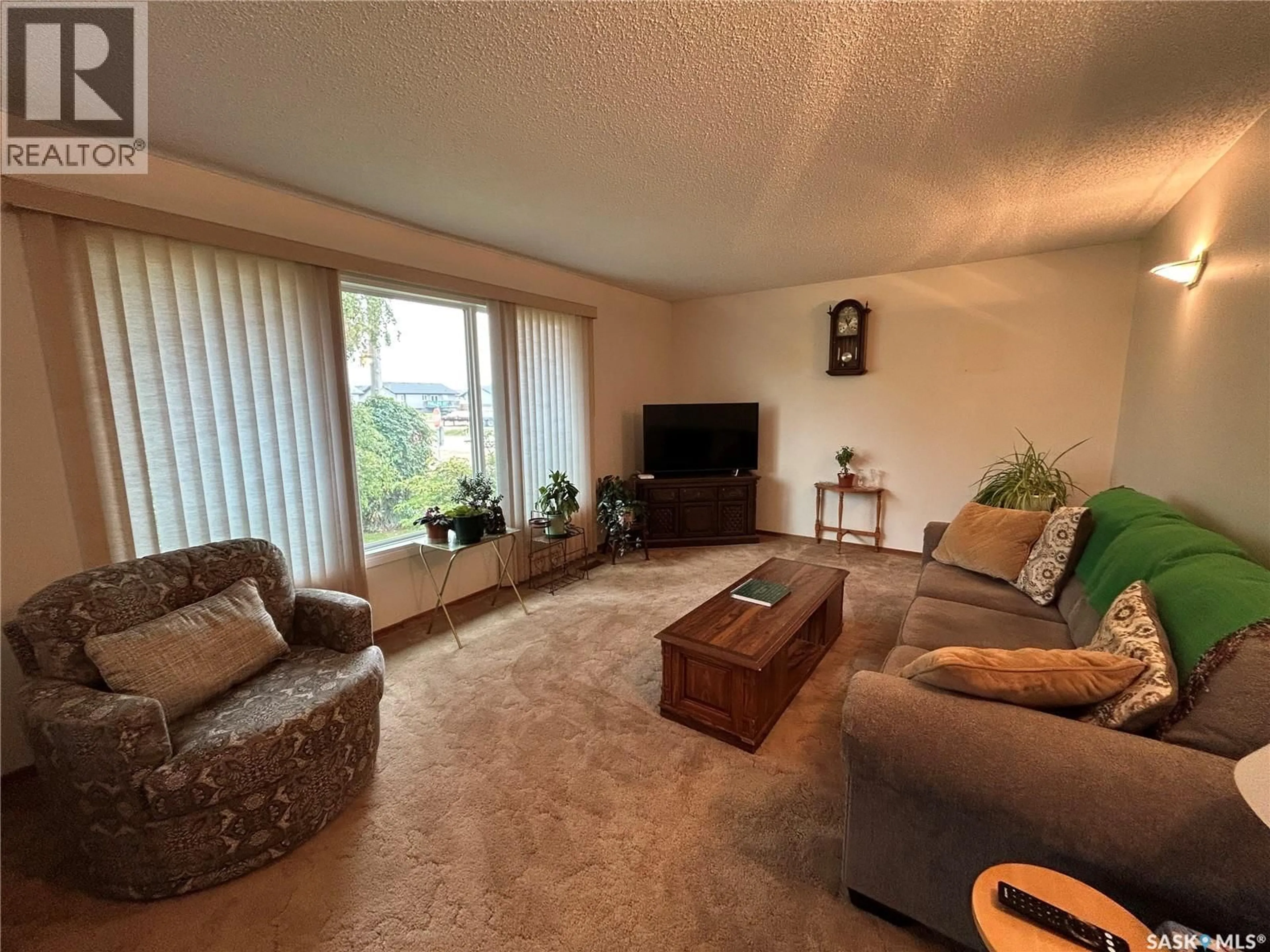 Living room with furniture, unknown for 101 PHILLIPS STREET, Muenster Saskatchewan S0K2Y0