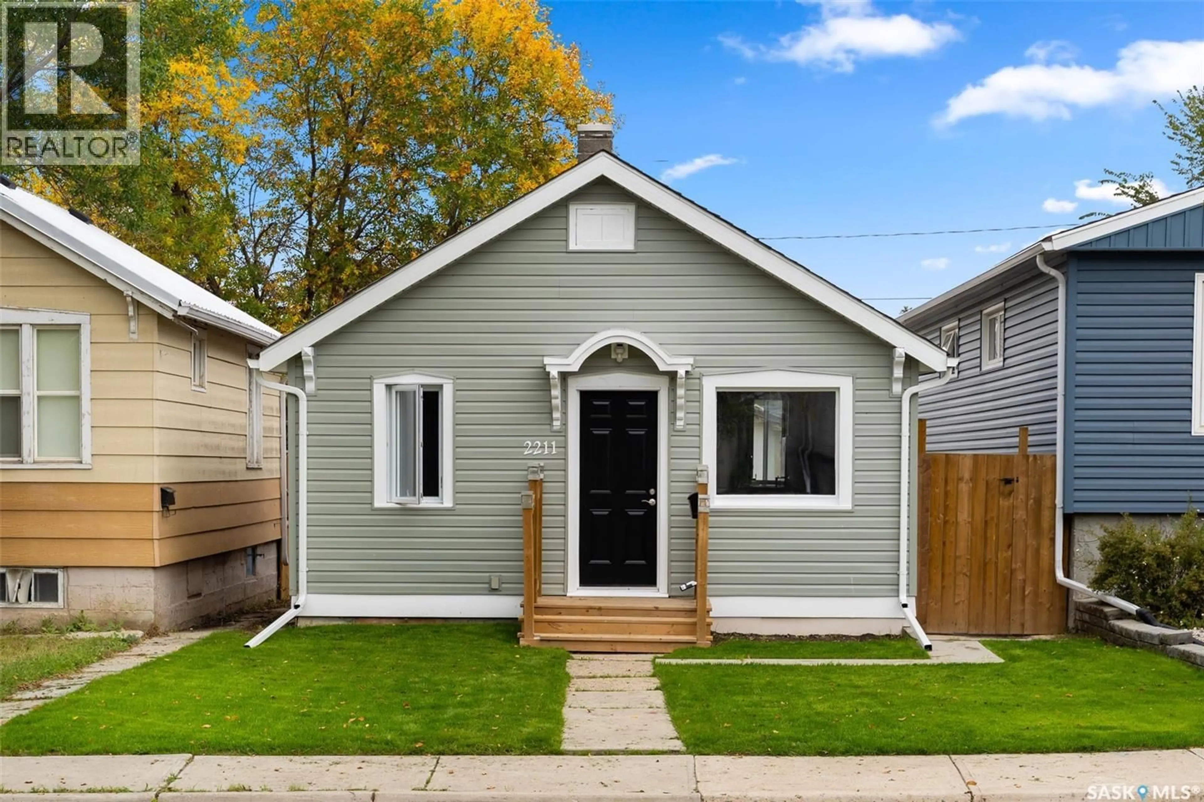Home with vinyl exterior material, street for 2211 MCDONALD STREET, Regina Saskatchewan S4N2Y9