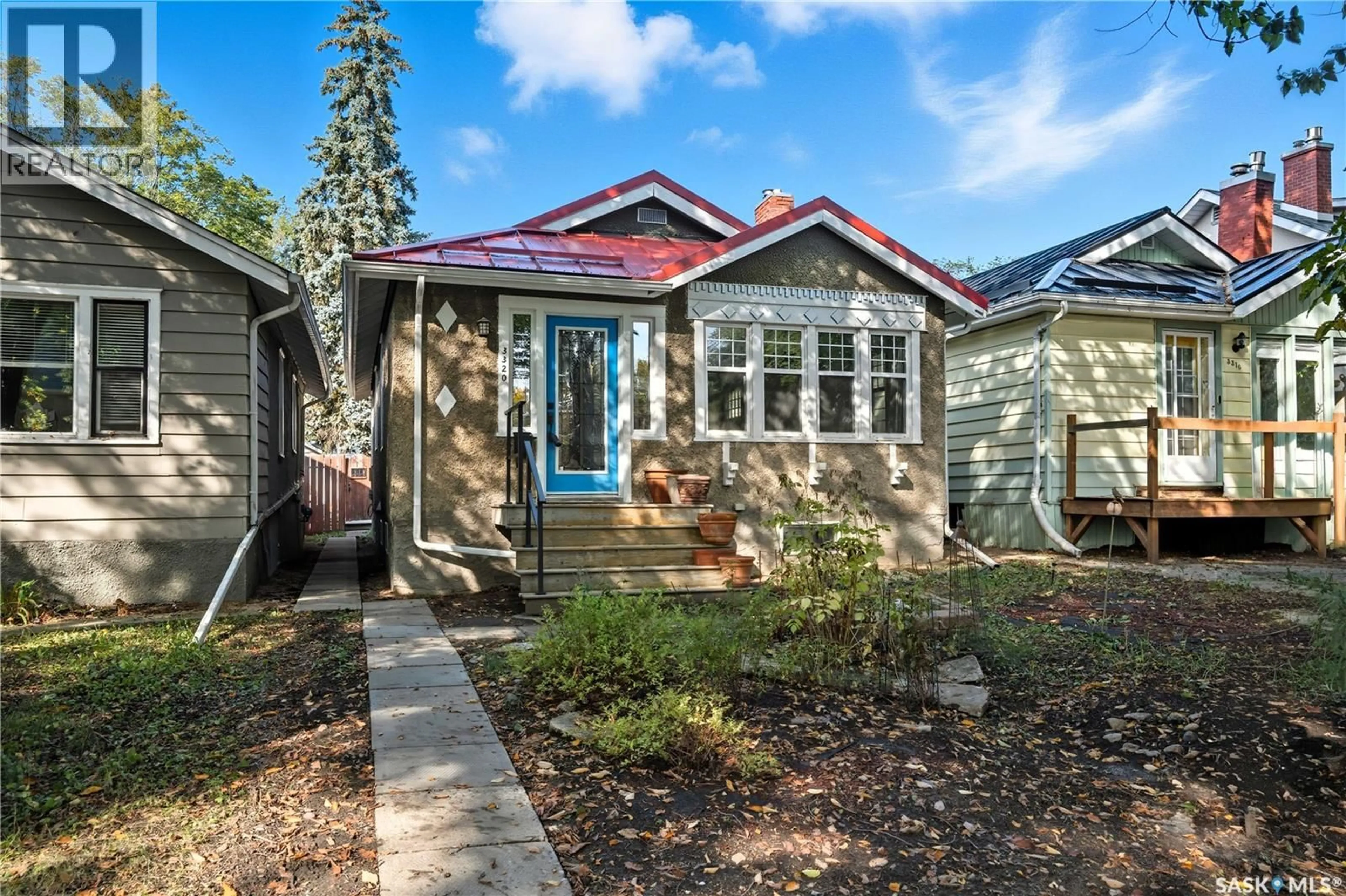 Home with vinyl exterior material, street for 3320 15TH AVENUE, Regina Saskatchewan S4T1T2
