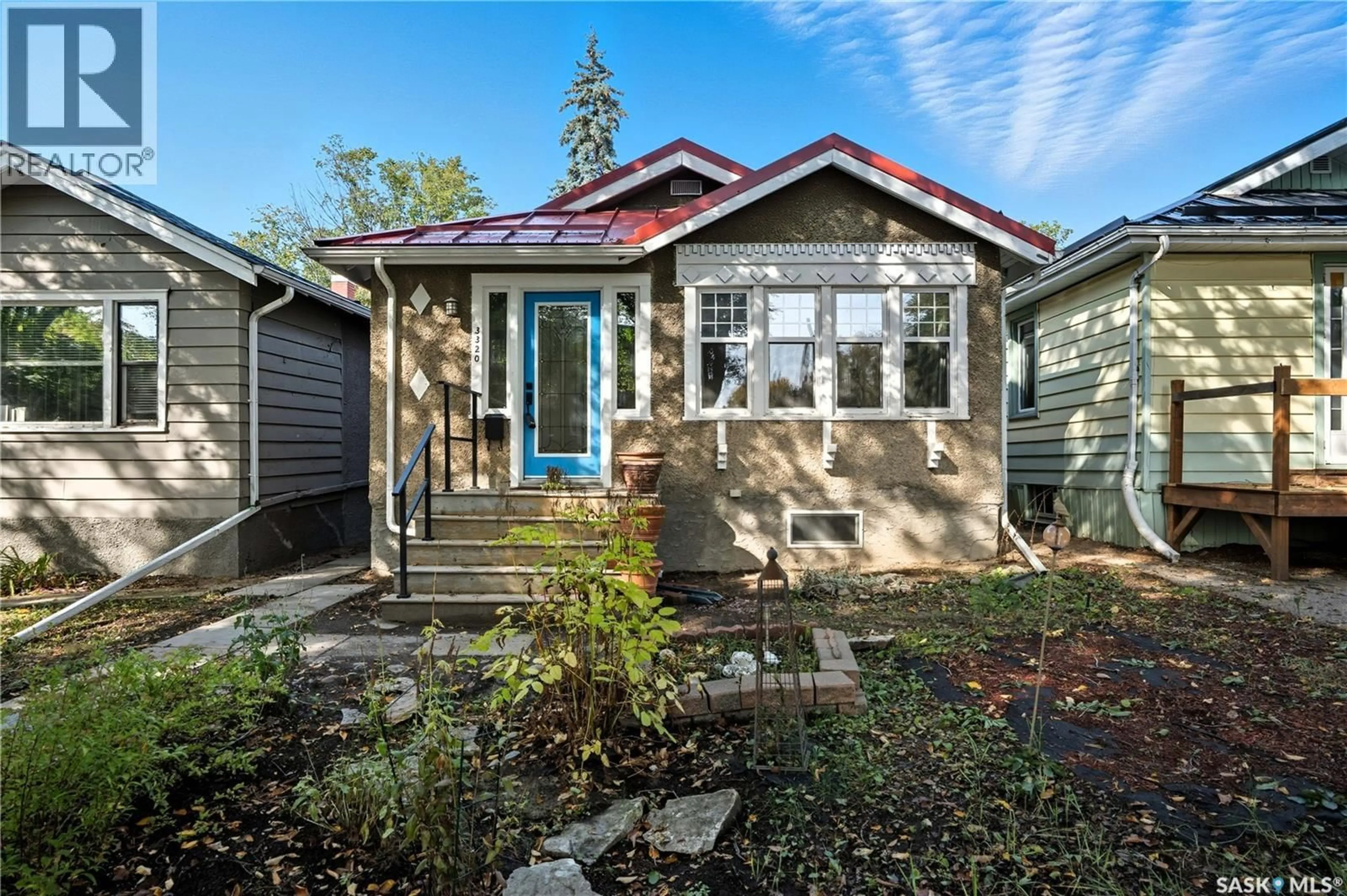 Home with vinyl exterior material, street for 3320 15TH AVENUE, Regina Saskatchewan S4T1T2