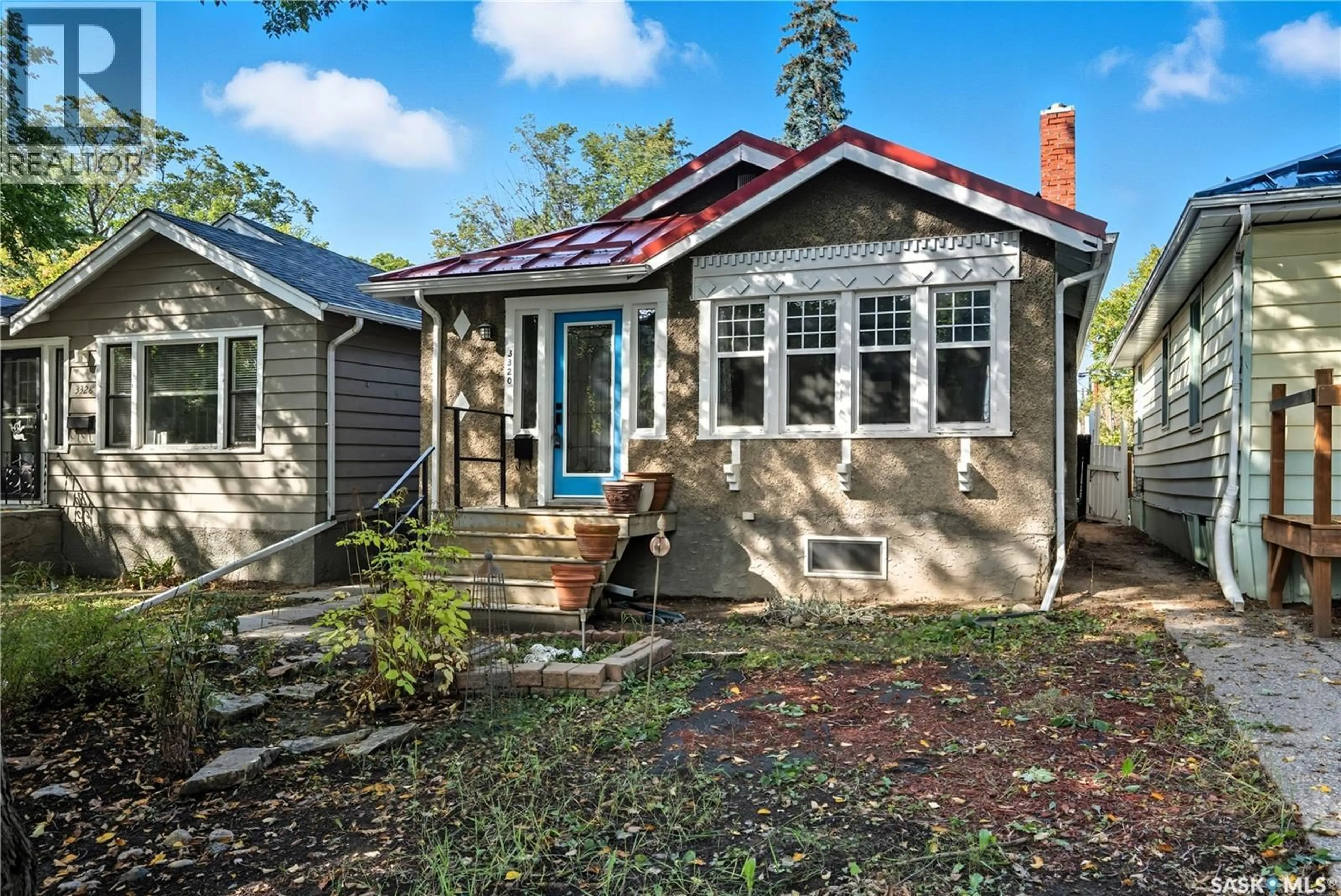 Home with vinyl exterior material, street for 3320 15TH AVENUE, Regina Saskatchewan S4T1T2