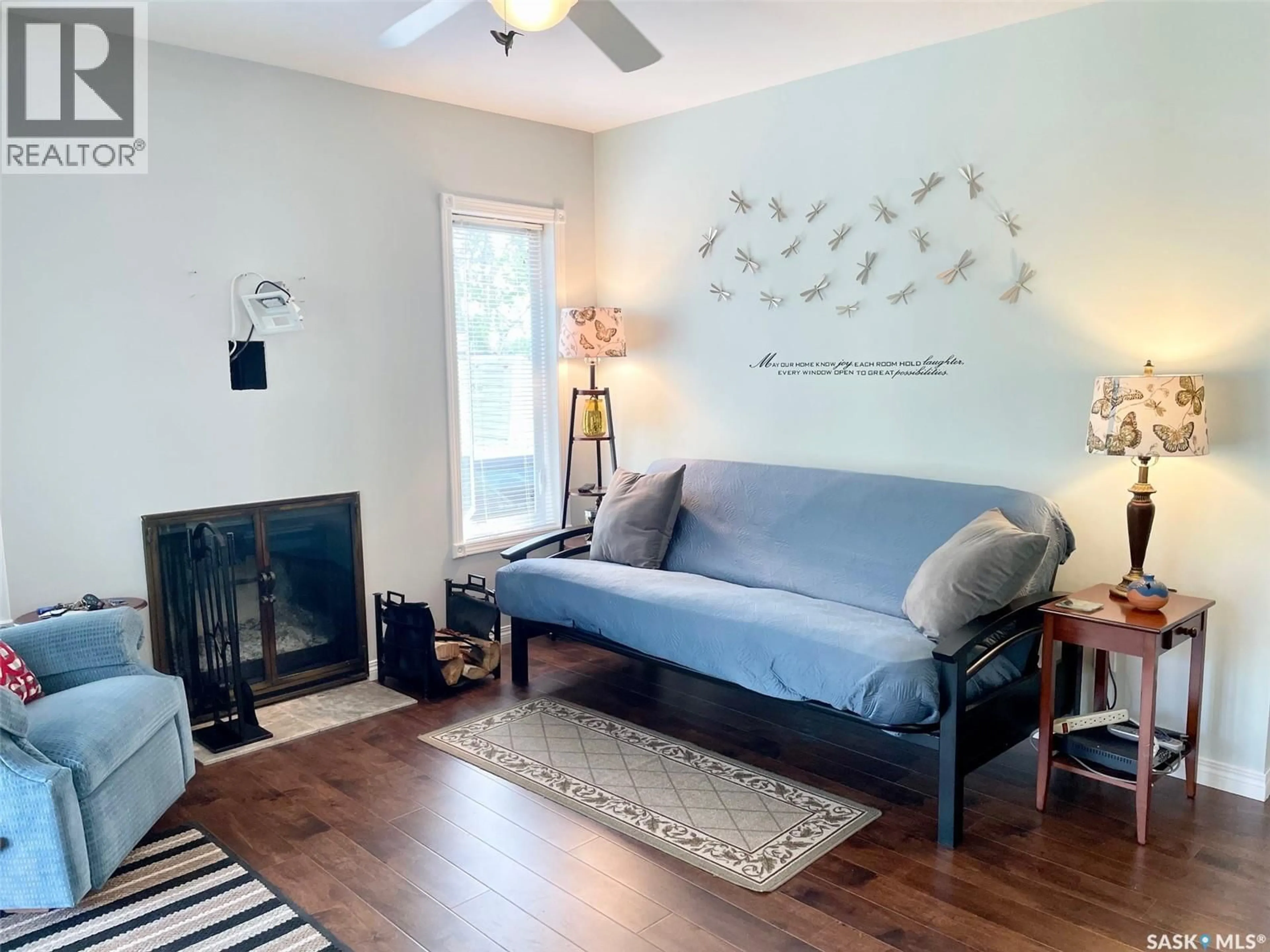 Living room with furniture, wood/laminate floor for 311 SANDY CRESCENT, Good Spirit Lake Saskatchewan S0A0L0